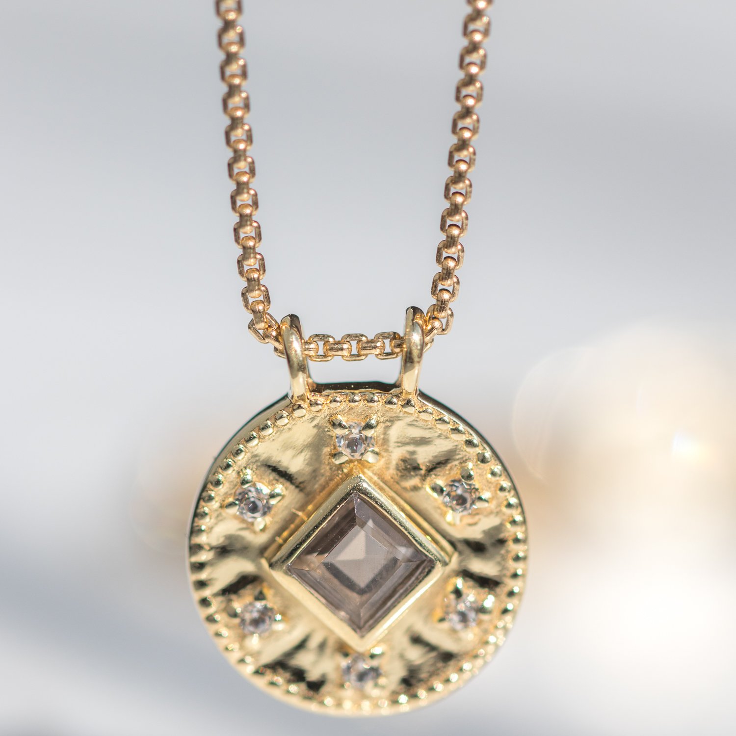Smokey quartz calin necklace in 14k gold fill by jewelry designer Lulu Designs at NEWTWIST