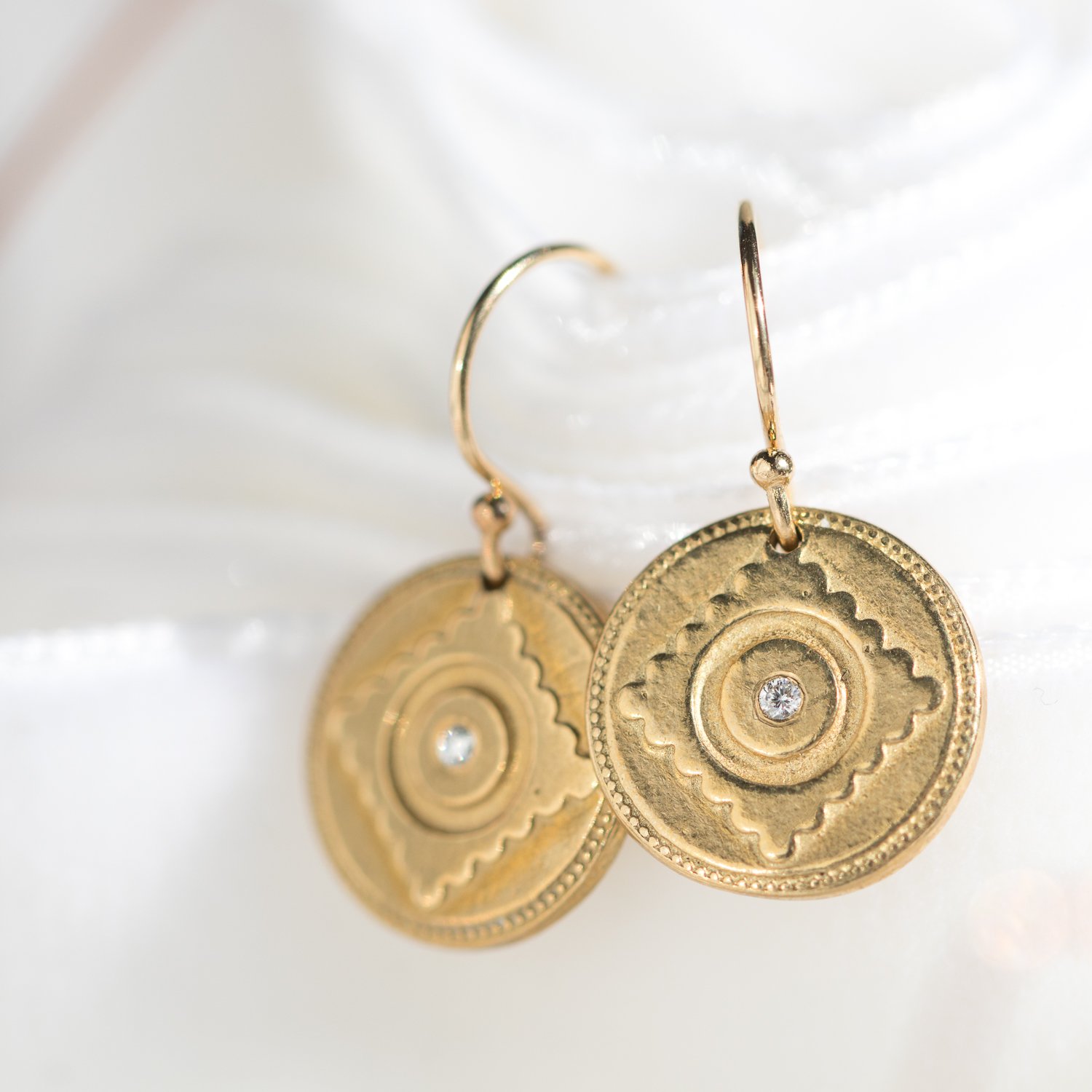 Leela gold disc earrings in 14k gold fill by jewelry designer Lulu Designs at NEWTWIST