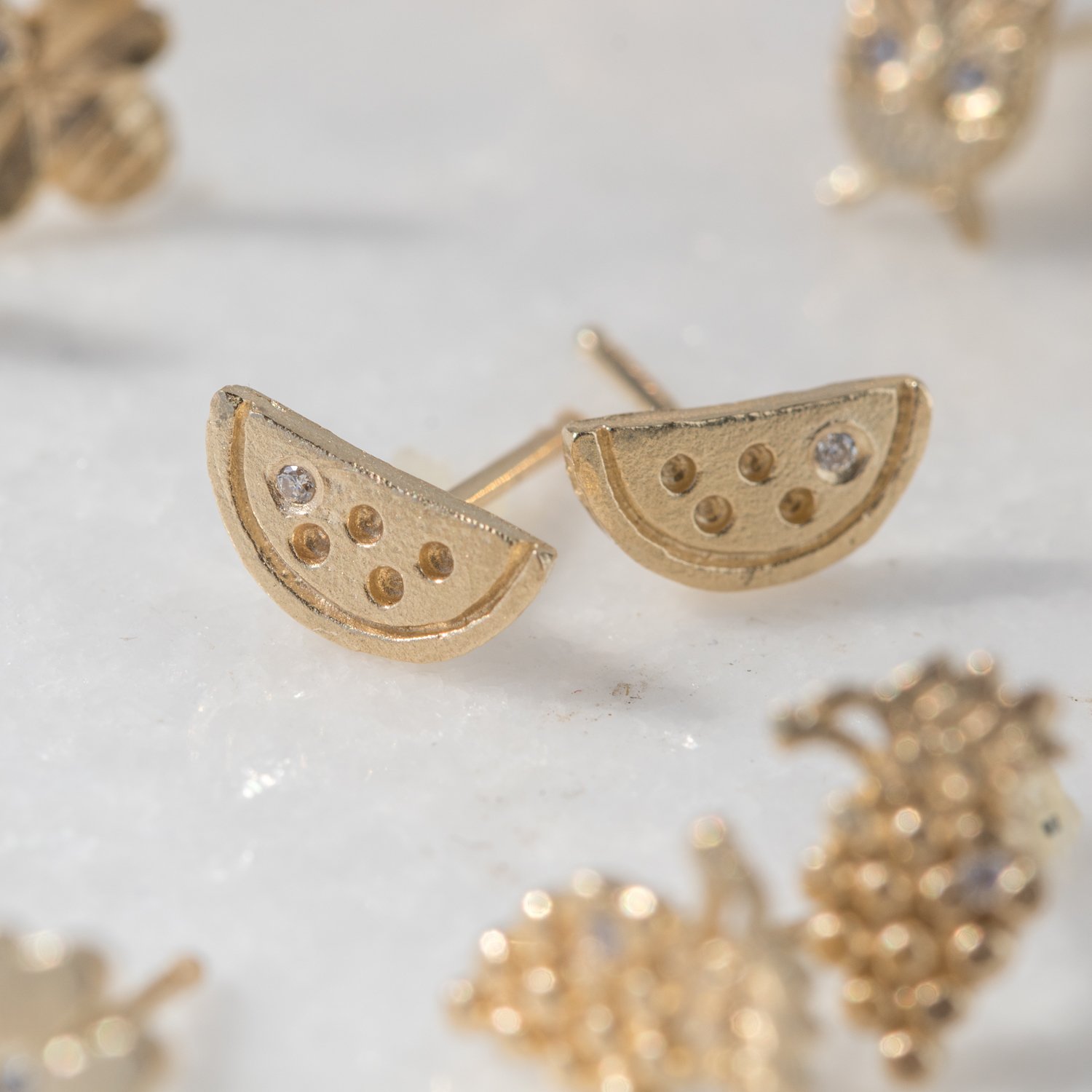 watermelon posts with diamonds in 14k yellow gold by jewelry designer Victoria Cunningham at NEWTWIST