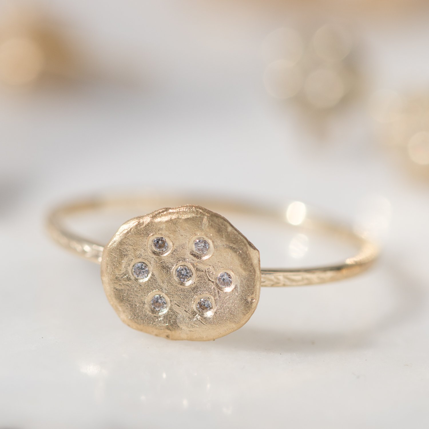 large golden flake stacking ring with white diamonds in 14k yellow gold by jewelry designer Victoria Cunningham