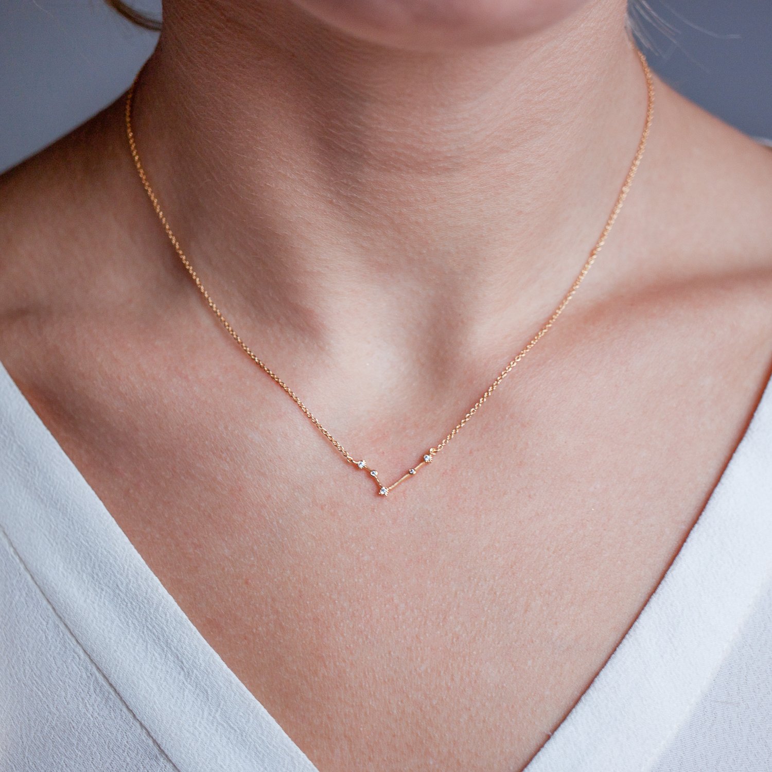 Tai: Gold simple chain necklace with Aries constellation