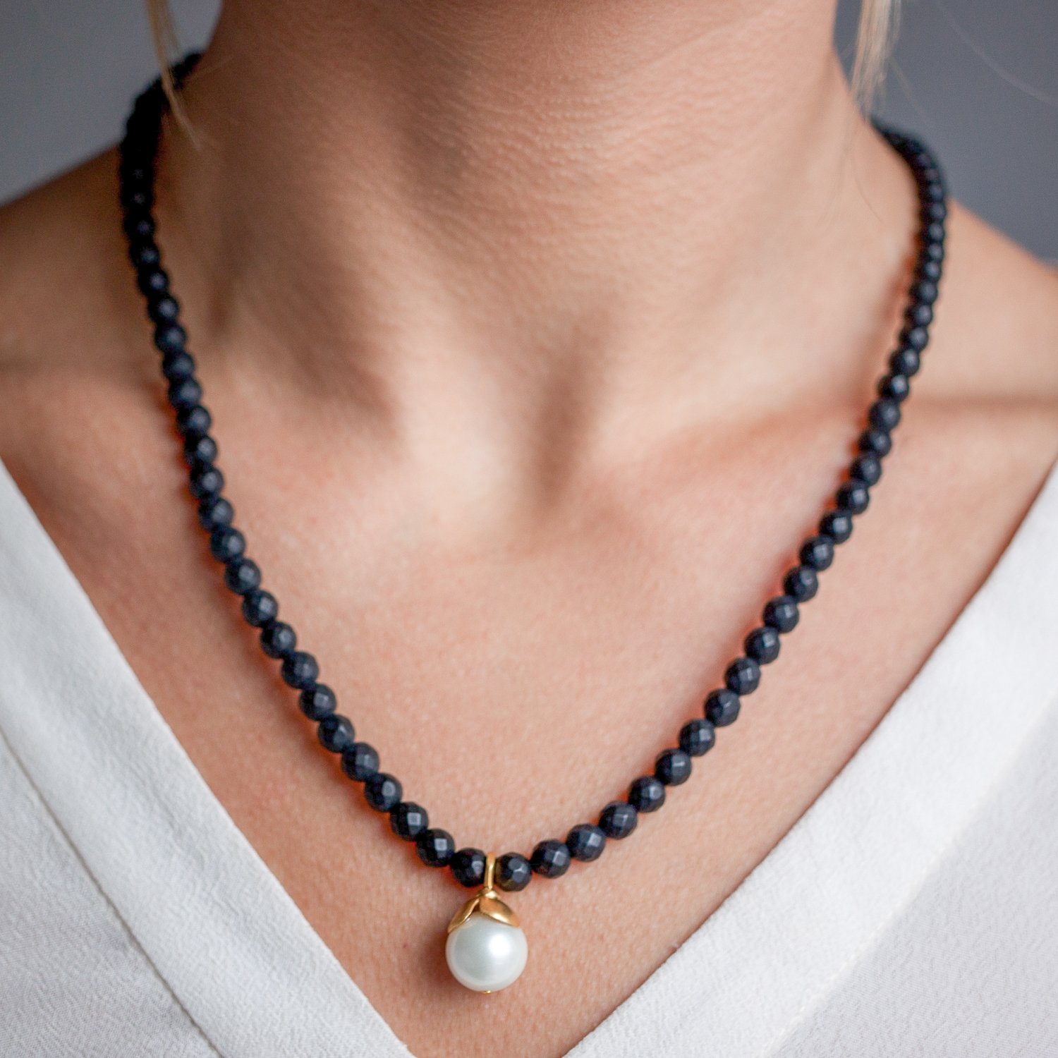 Catherine Canino: 18K matte gold over brass MATTE ONYX flower petal drop stretch necklace w/ pearl drop