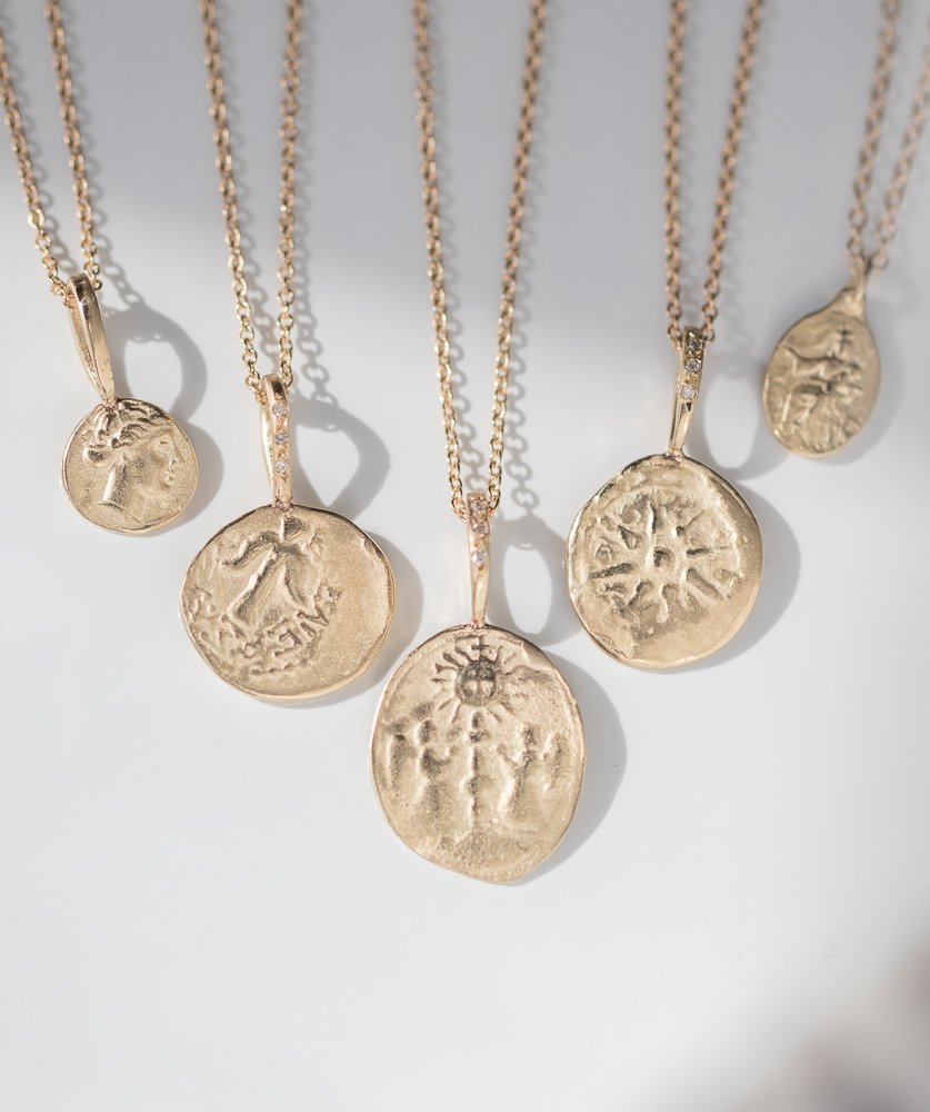 Robin Haley gold pendant artifact necklace