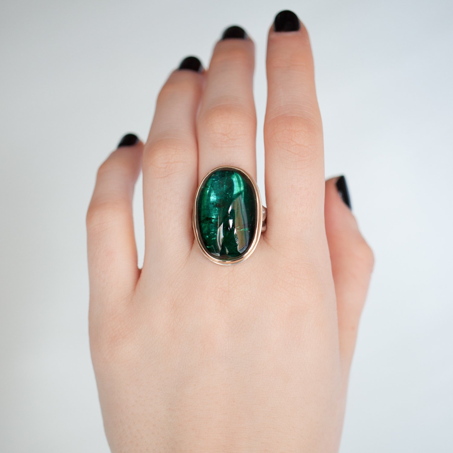 Jamie Joseph: sterling and 14K gold ring w large vertical oval smooth indicolite on madrona band