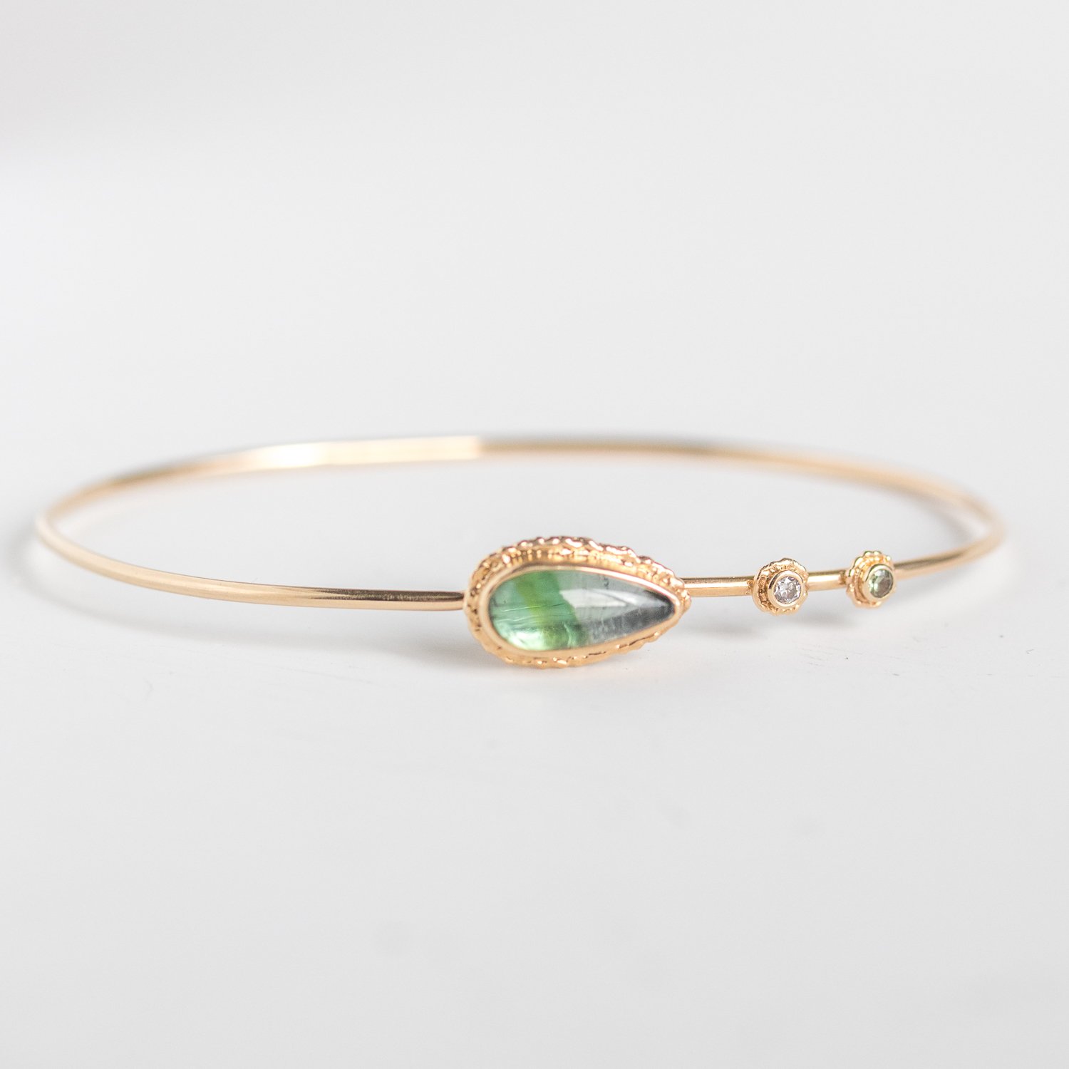 Jamie Joseph Trunk Show: 14K gold Bracelet w/ Teardrop Green Tourmaline on Ruffled Platform w/ Double Diamond Accent .03TCW
