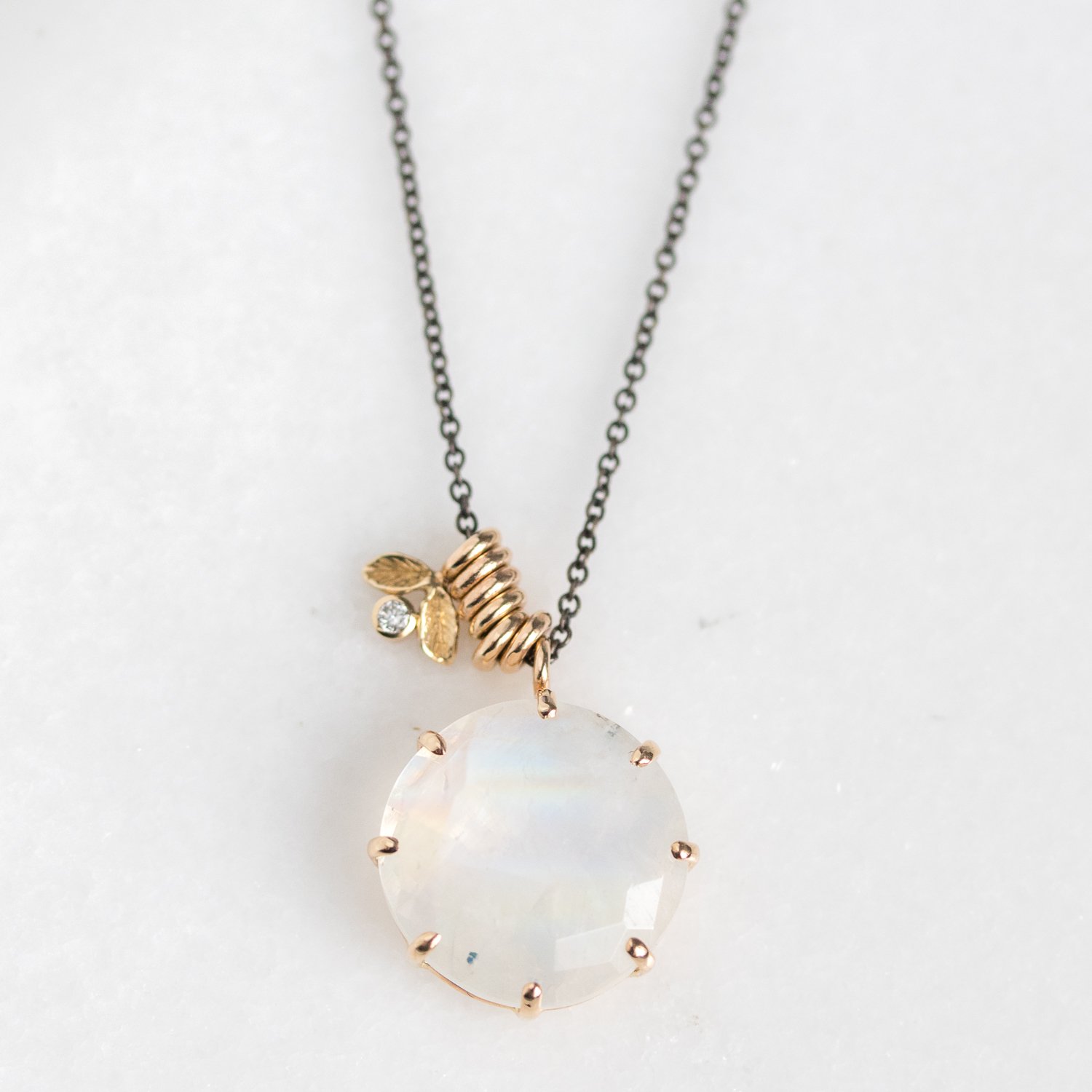 Jamie Joseph Trunk Show: Oxidized Sterling & 14K Gold Necklace w/ Round Table Up White Rainbow Moonstone Multi Prong Pendant w/ Multiple Sliding Rings & 0.025 ct Diamond Double Leaf Accent (18")