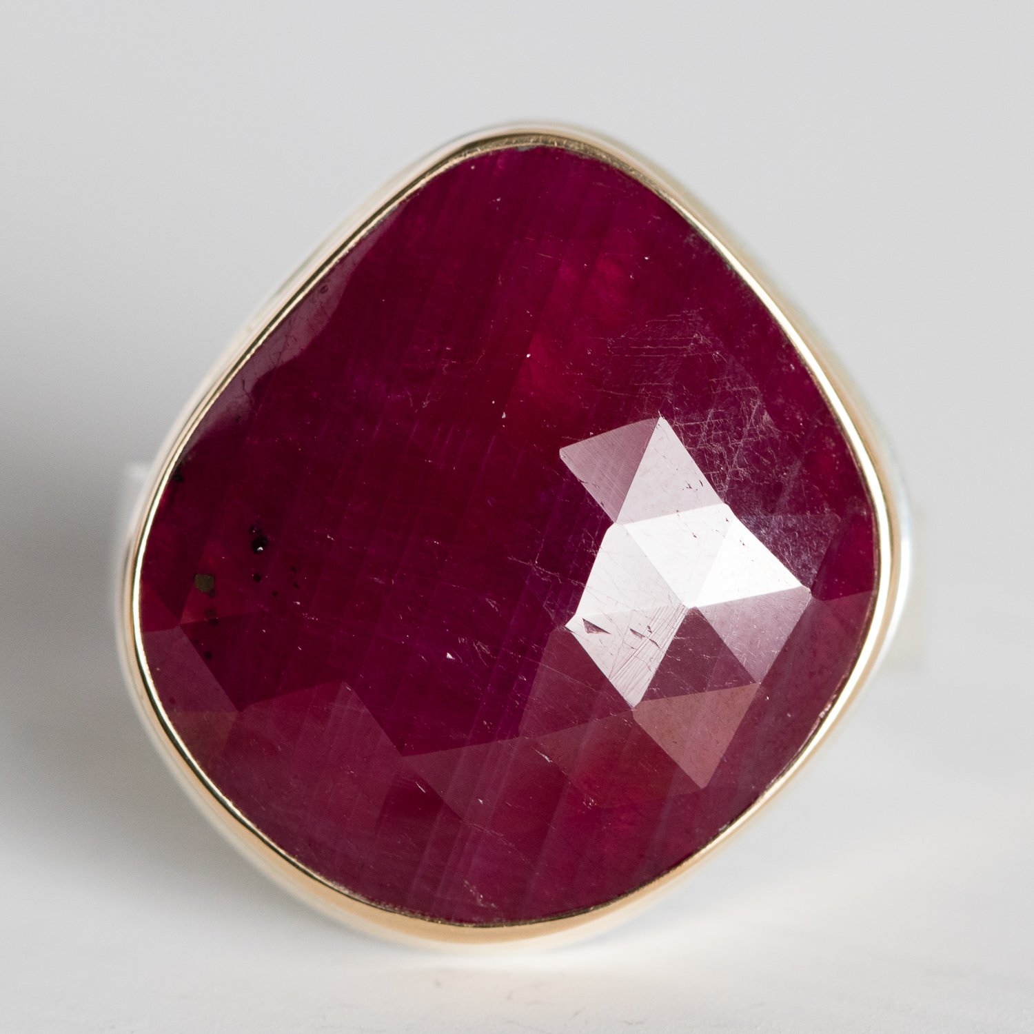 Jamie Joseph: 14K gold and sterling silver ring with vertical rose cut asymmetrical Indian ruby on live edge band Size 7.75