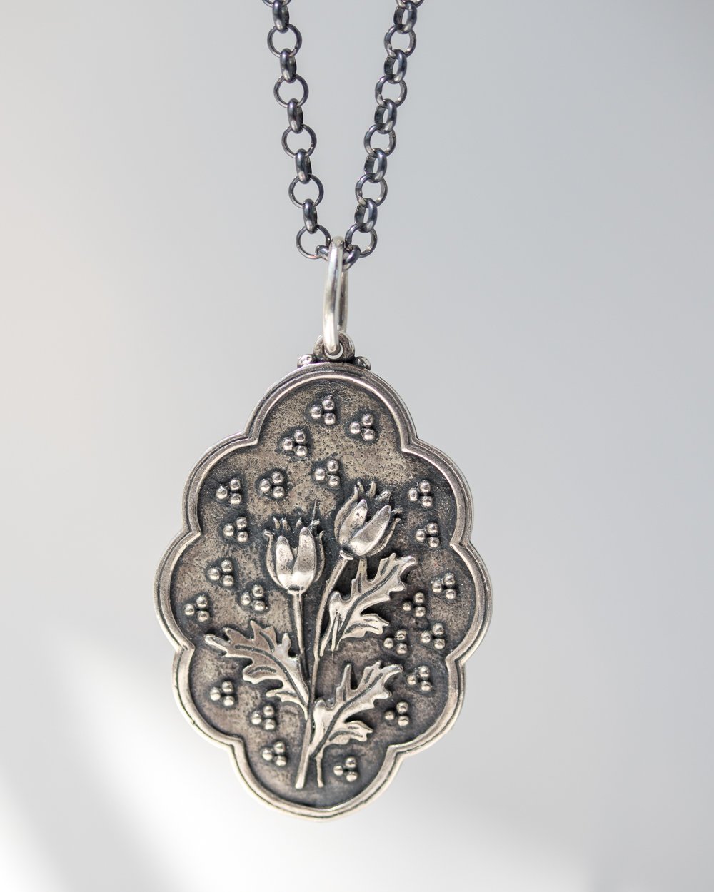 Silver charm by Erica Molinari