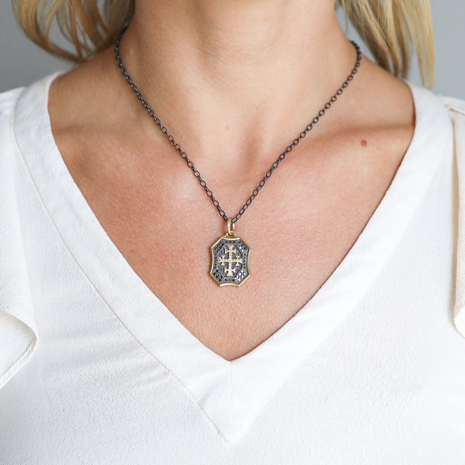 Erica Molinari Trunk Show: SS and 18K black diamond shield with 18K engraved greek cross charm "forget me not" .40 TCW