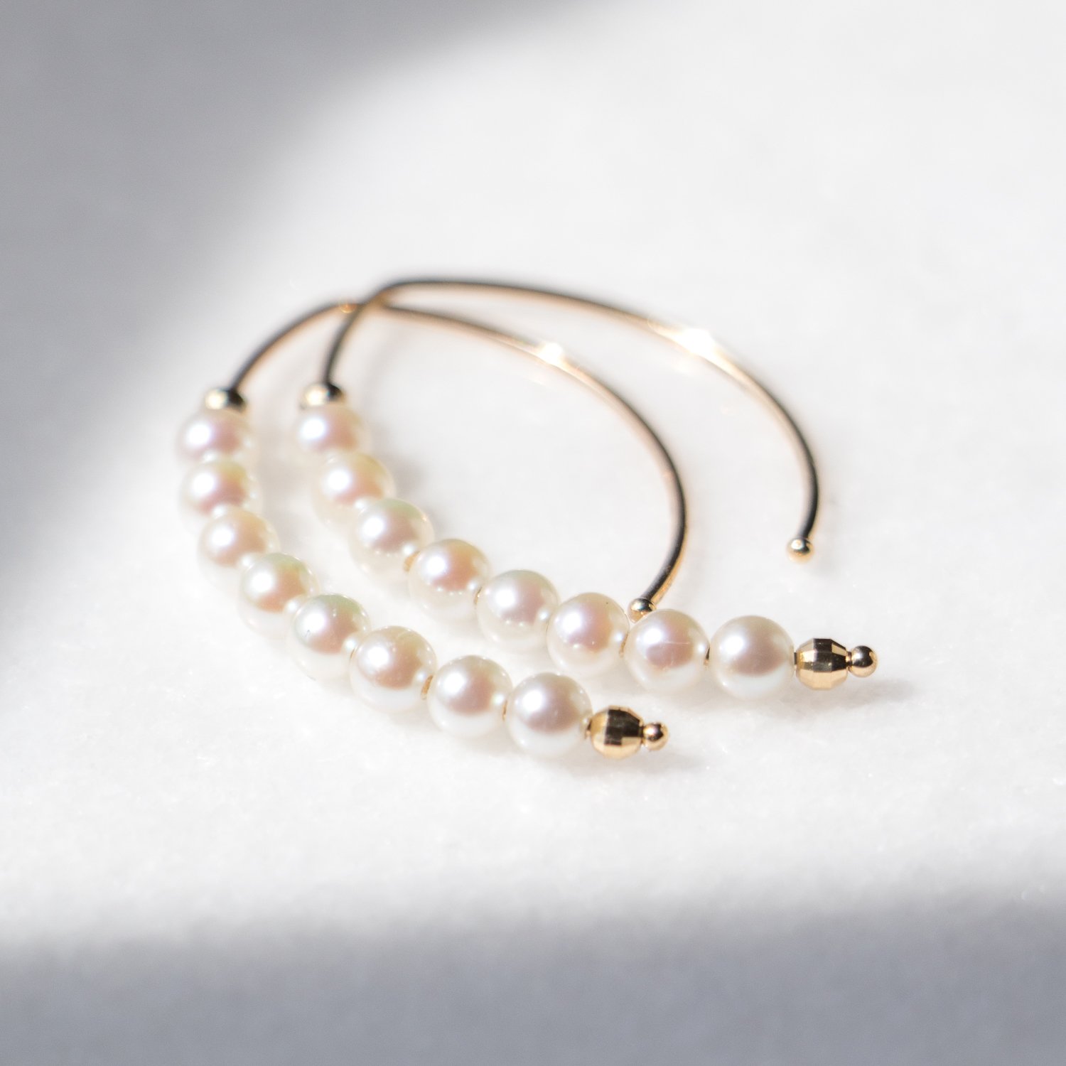 Akoya Pearl Open Hoops in 14k gold by Mizuki