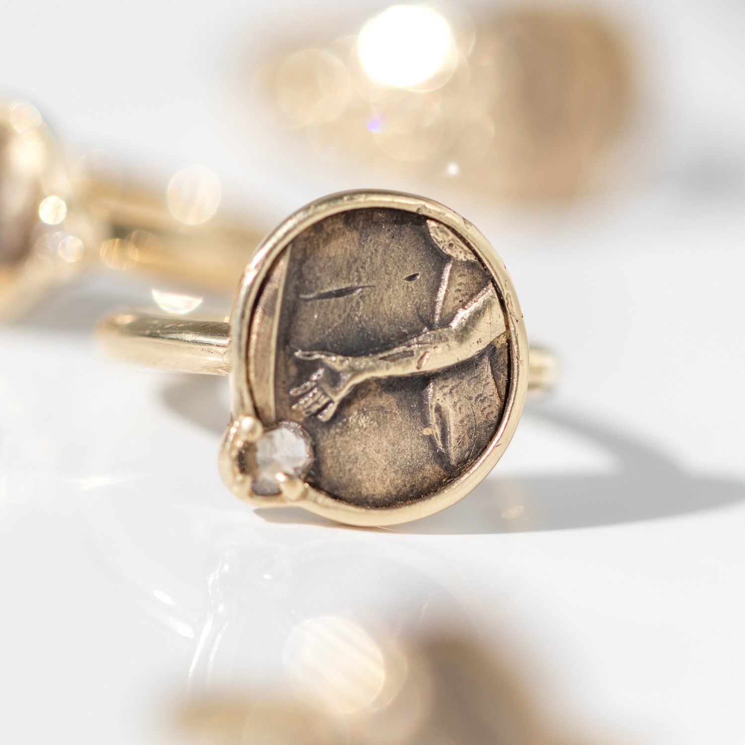 The Giving Ring in 14K gold with a diamond by Atelier Narce