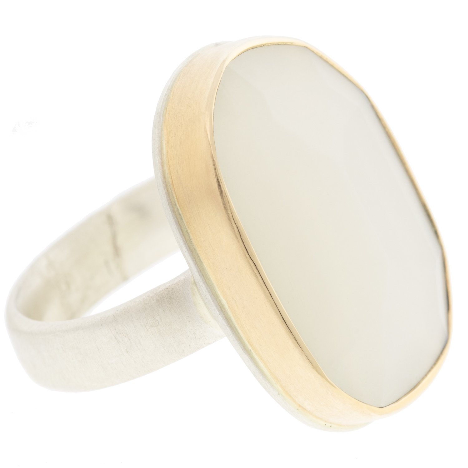 Jamie Joseph: SS & 14k gold ring with vertical asymmetrical faceted white moonstone on comfort band