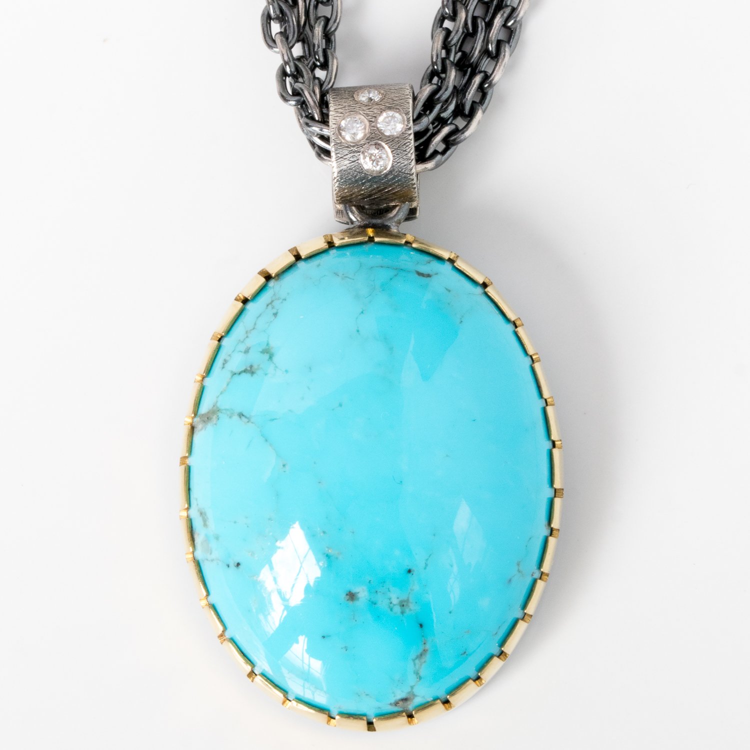 Rene Escobar Trunk show: turquoise oval pendant on SS/dia enhancer