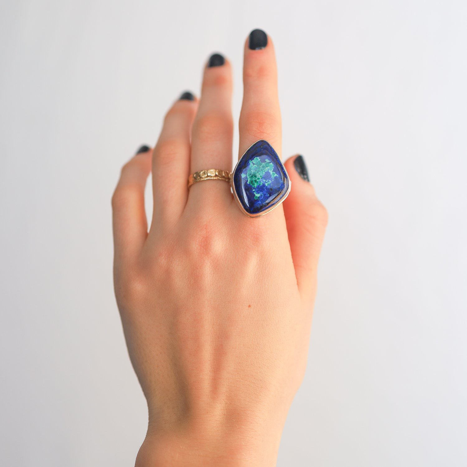 Jamie Joseph: SS & 14k gold ring with vertical asymmetrical smooth azurite-chrysocolla-malachite on Y band