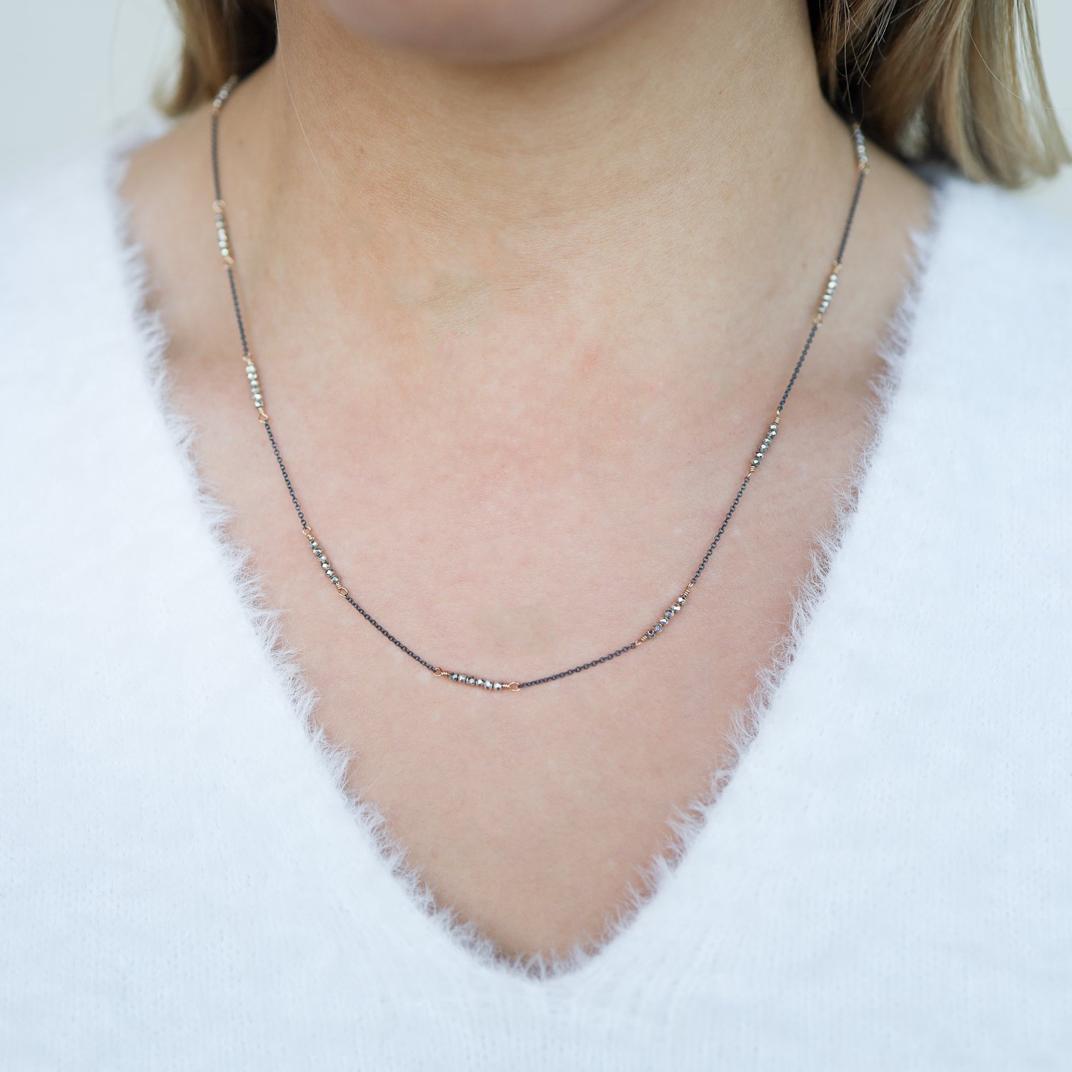 Dana Kellin: 20" station necklace: silver pyrite with dark silver and gold fill