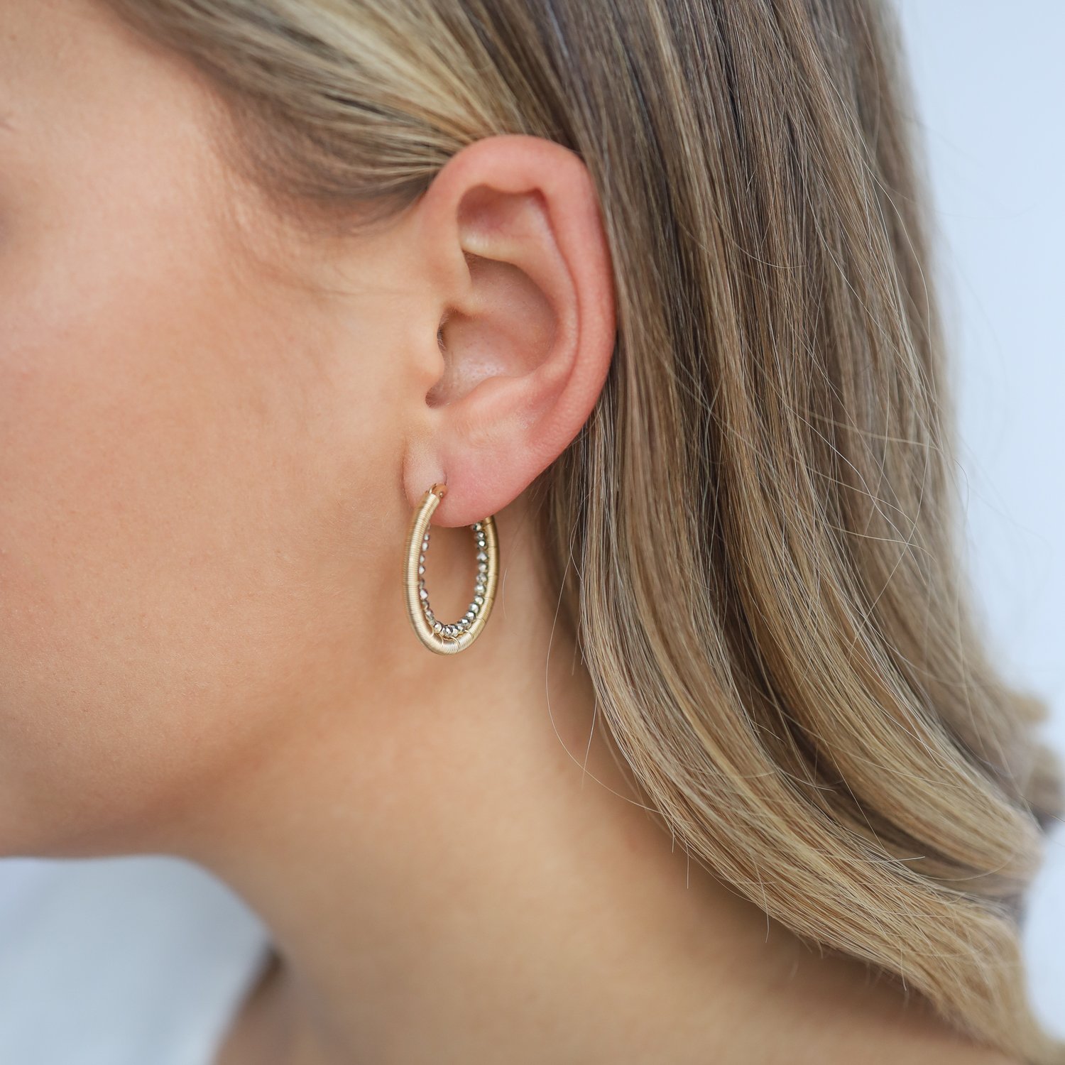 Dana Kellin: Silver pyrite and goldfill hoops with inner crystals 1"