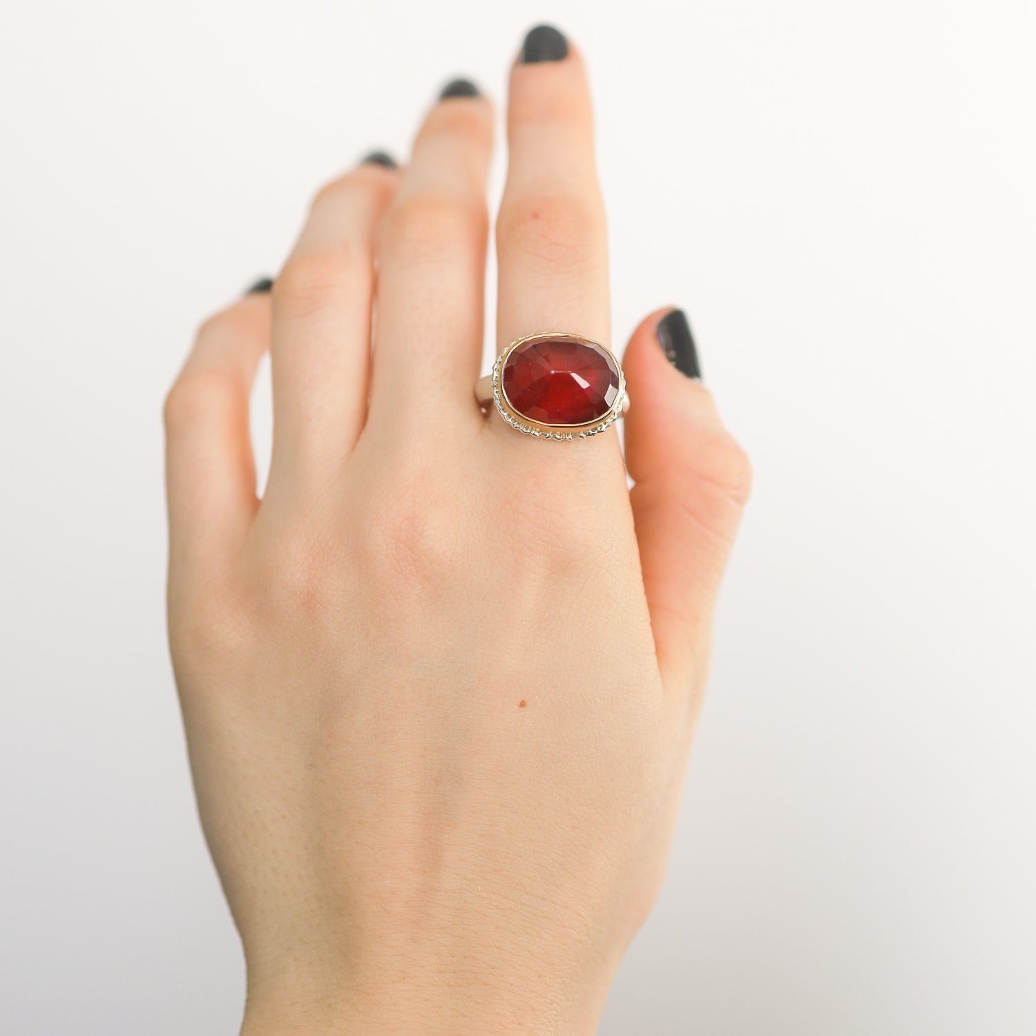 Jamie Joseph: SS & 14k Gold Ring w/oval inverted african ruby on lava platform and organic band,sz 7.5
