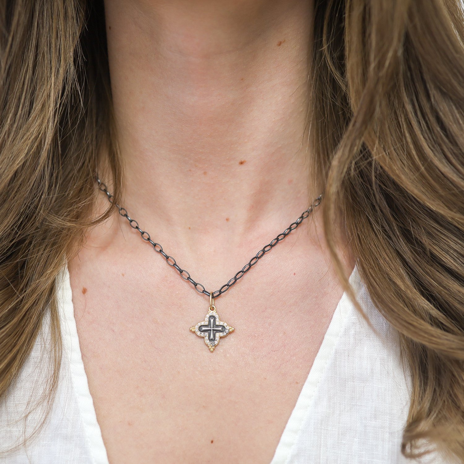 Erica Molinari Trunk Show: SS and 18K diamond frame baby clover cross "hope" .32 cts