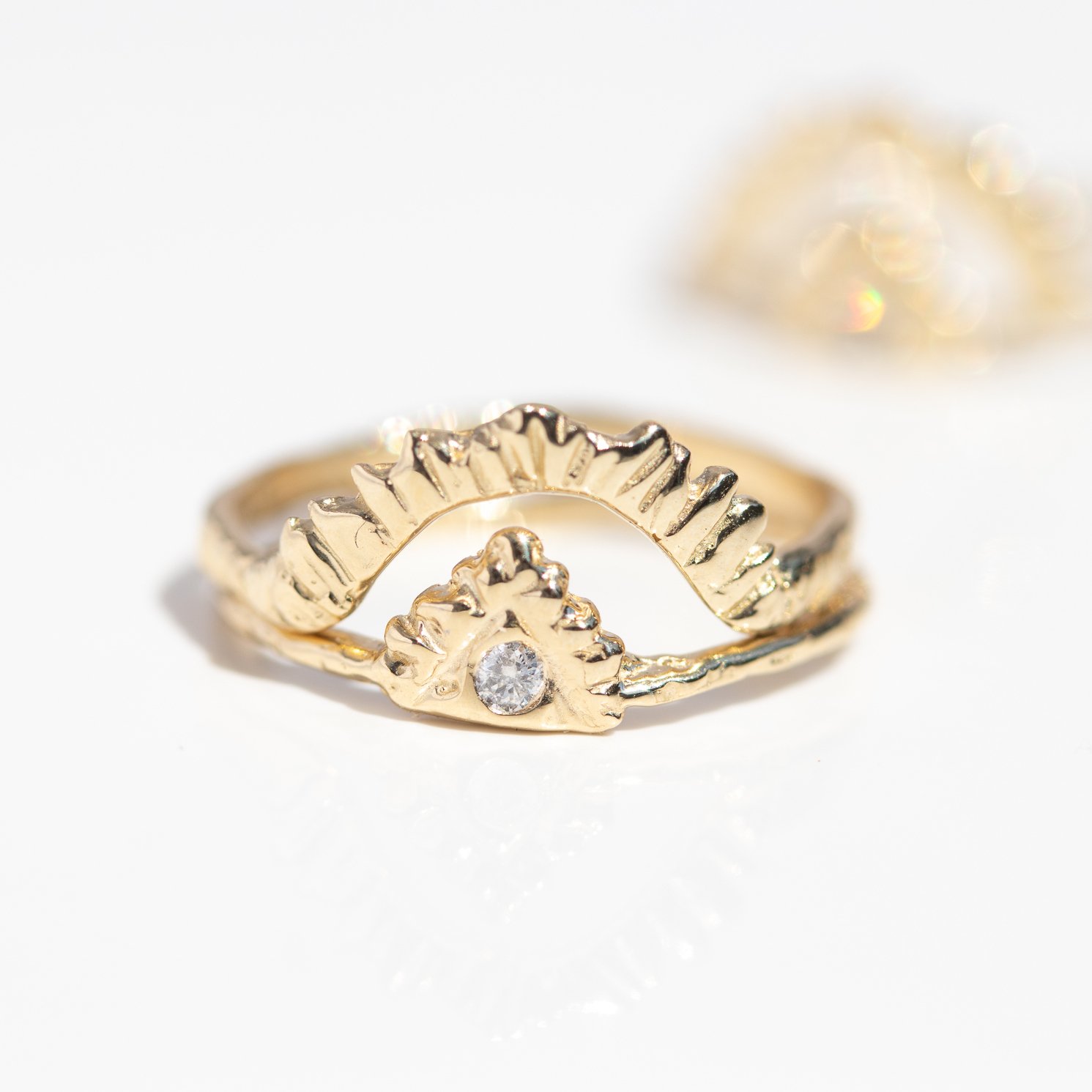 Pyramid light ring in 14k yellow gold with one white diamond by jewelry designer Communion by Joy