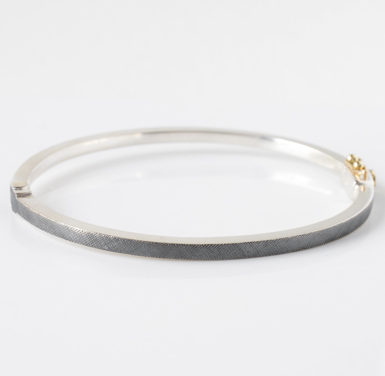 Rene Escobar: Bangle, ADAM, 2.5MM, Oxidized sterling silver, Diamonds, .35 TCW, Size medium, 1/8" in width.