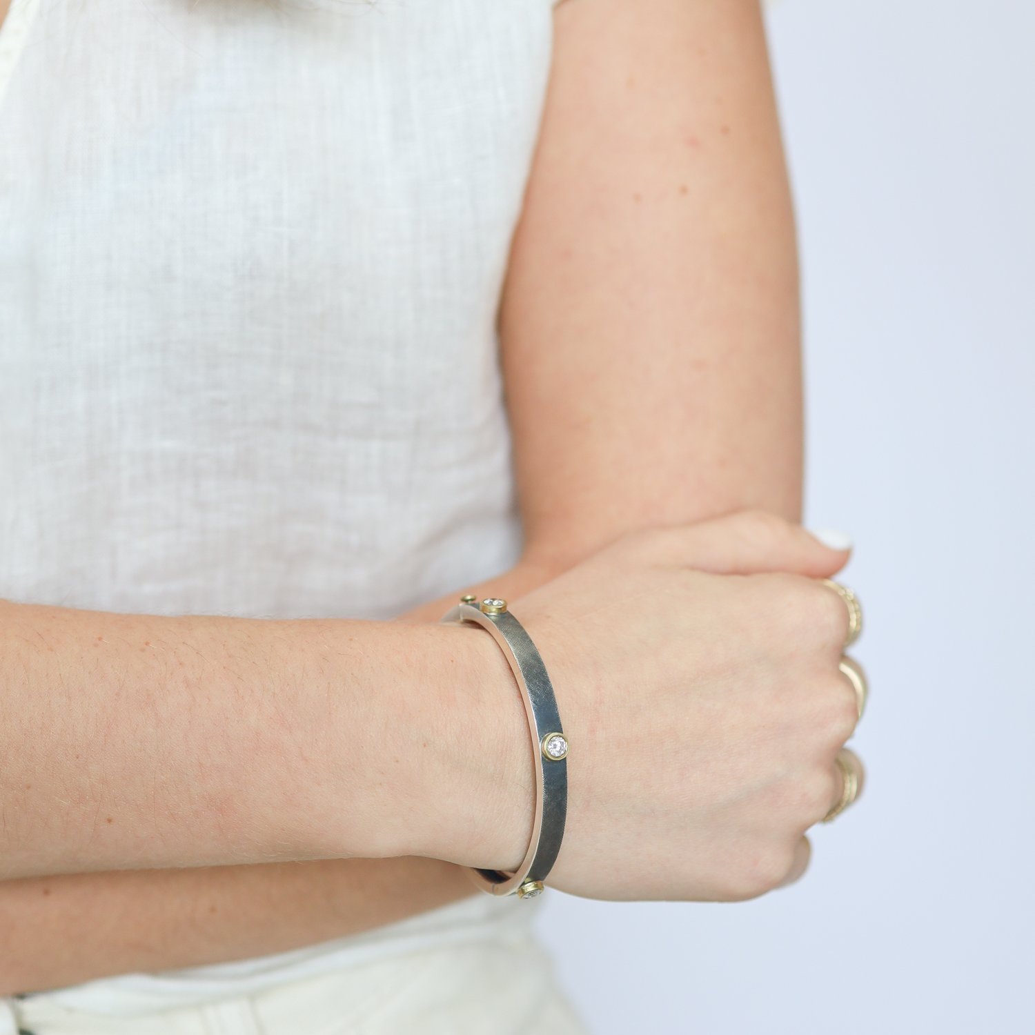 Rene Escobar : Bangle, JUNIA, Wide, Oxidized sterling silver, Diamond, .75 TCW, 18K gold, Size medium, 1/4" in width.