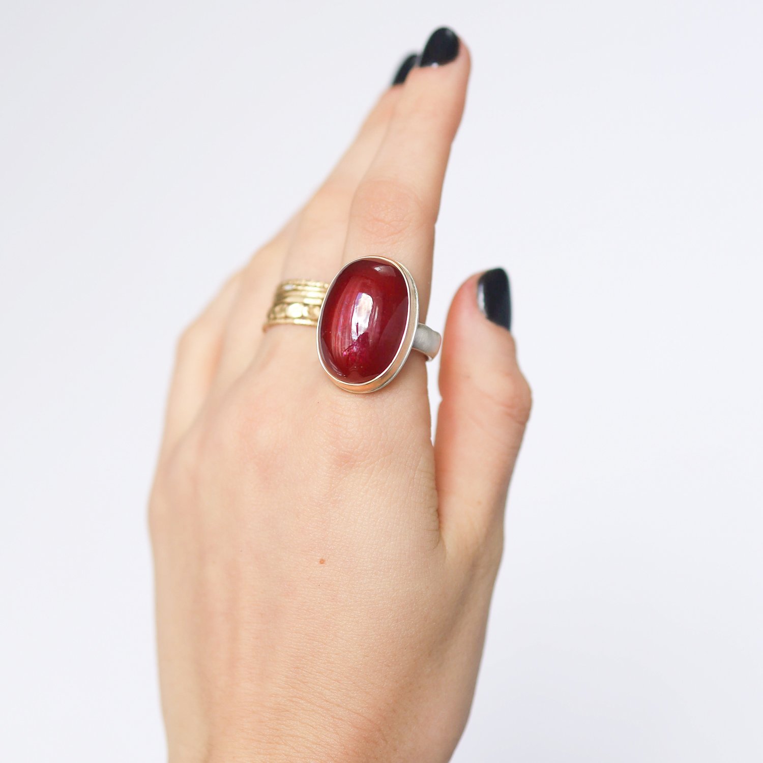 Jamie Joseph: Ring, Vertical oval smooth, 14K yellow gold bezel set African ruby, Sterling silver groovy band, Stone measures 15/16 x 5/8, Currently available in size 8
