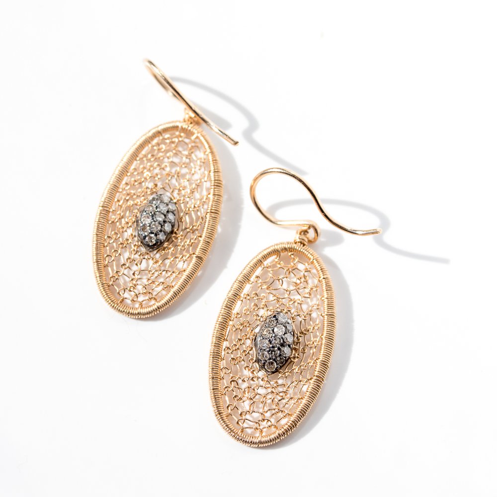Oval woven earrings in 14k yellow gold and diamonds by jewelry designer Dana Kellin