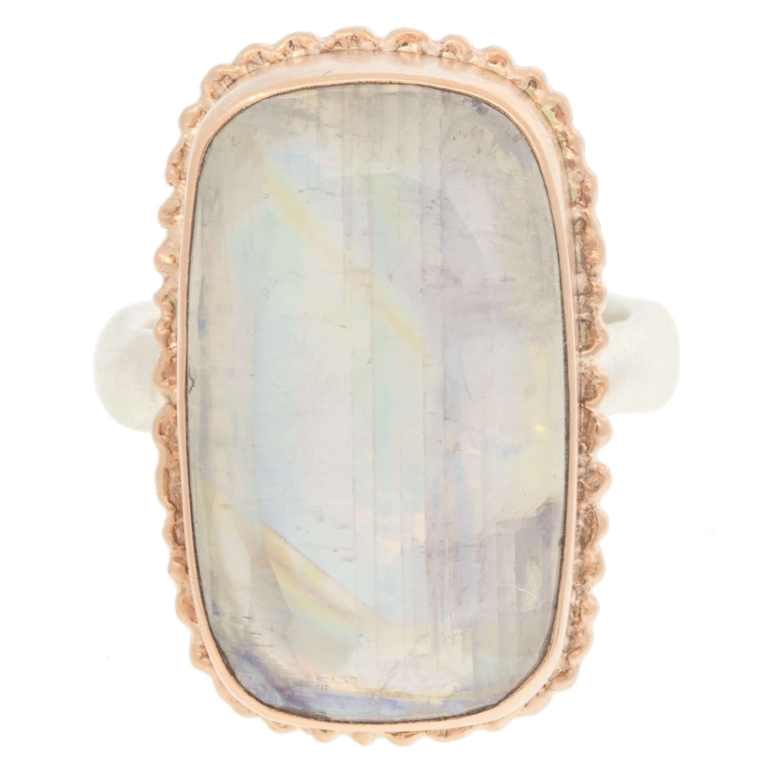 Jamie Joseph: Ring, Vertical rectangular table up, 14K rose gold bezel set white rainbow moonstone on ruffled platform, Sterling silver middle groovy band, Stone measures / x /, Currently available in size