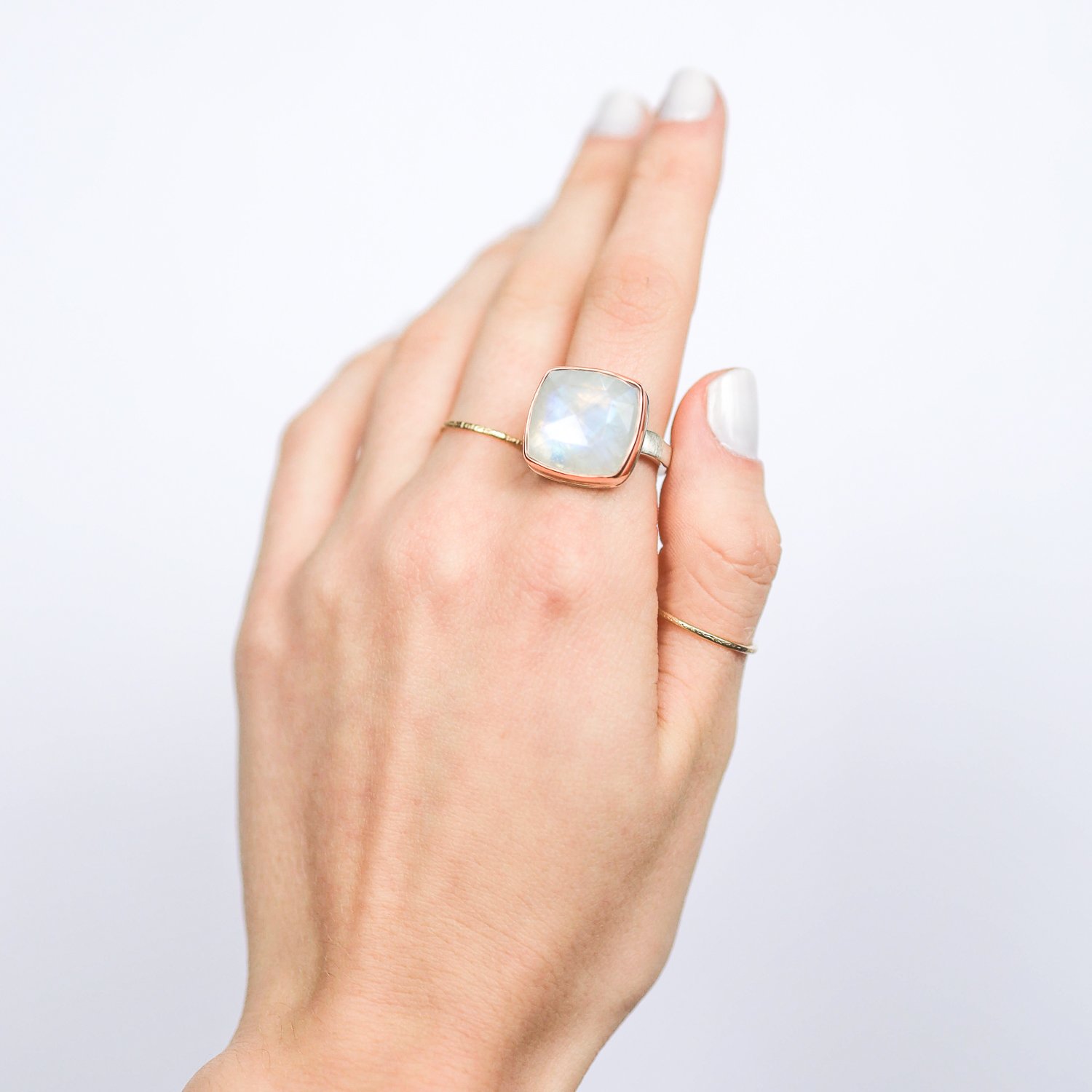 Jamie Joseph: Ring, Small square rose cut, 14K rose gold bezel set white rainbow moonstone, Sterling silver soft live edge band, Stone measures / x /, Currently available in size