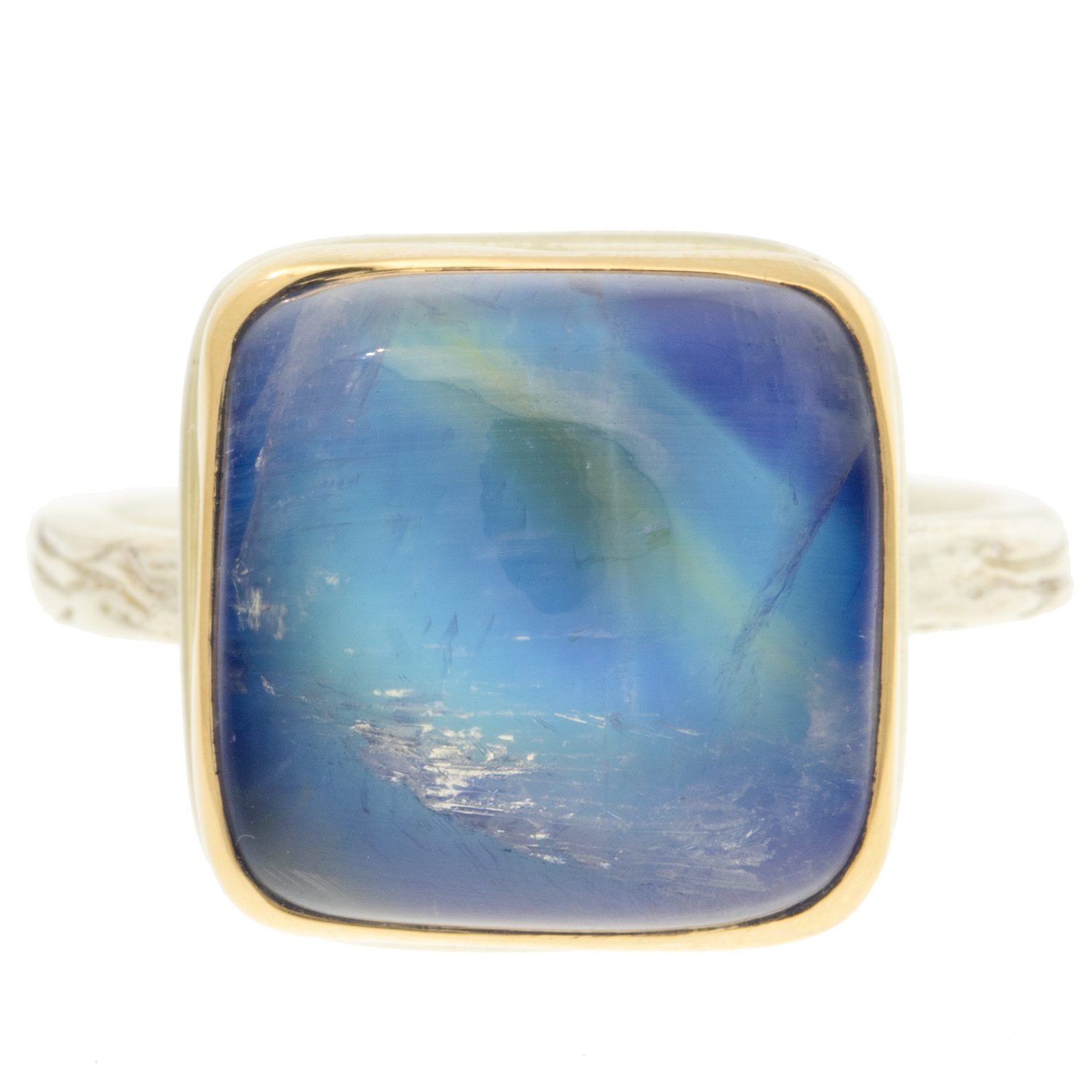 gold and silver ring with moonstone by jewelry designer jamie Joseph