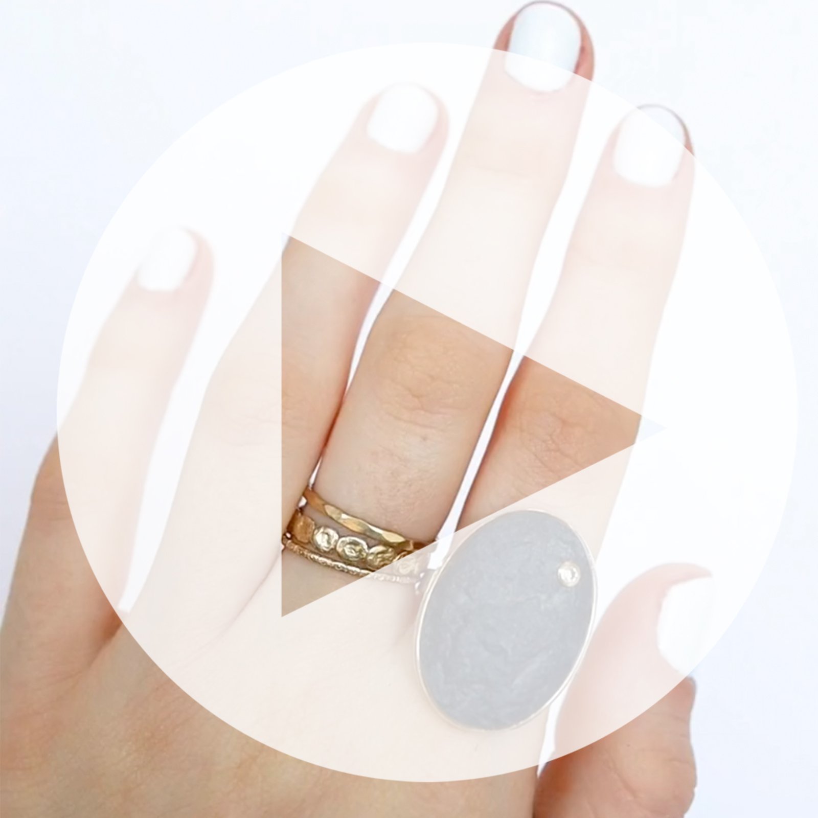 Jamie Joseph: Ring, Oval surface faceted, 14K yellow gold bezel set Hematite, Diamond, .03ct, Sterling silver X band, Stone measures 1 x 11/16, Currently available in size 7 1/4