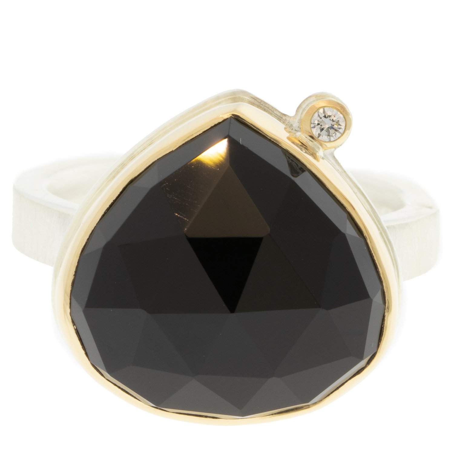 gold and silver ring with black onyx by jewelry designer jamie Joseph