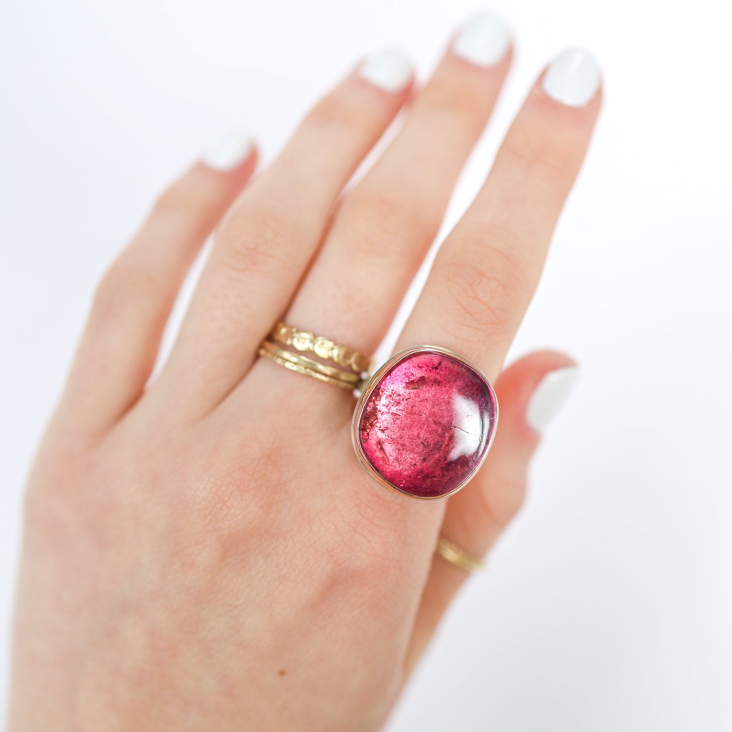 Jamie Joseph: Ring, Vertical asymmetrical smooth, 14K rose gold bezel set pink tourmaline, Sterling silver X band, Stone measures 7/8 x 3/4, Currently available in size 7 1/4