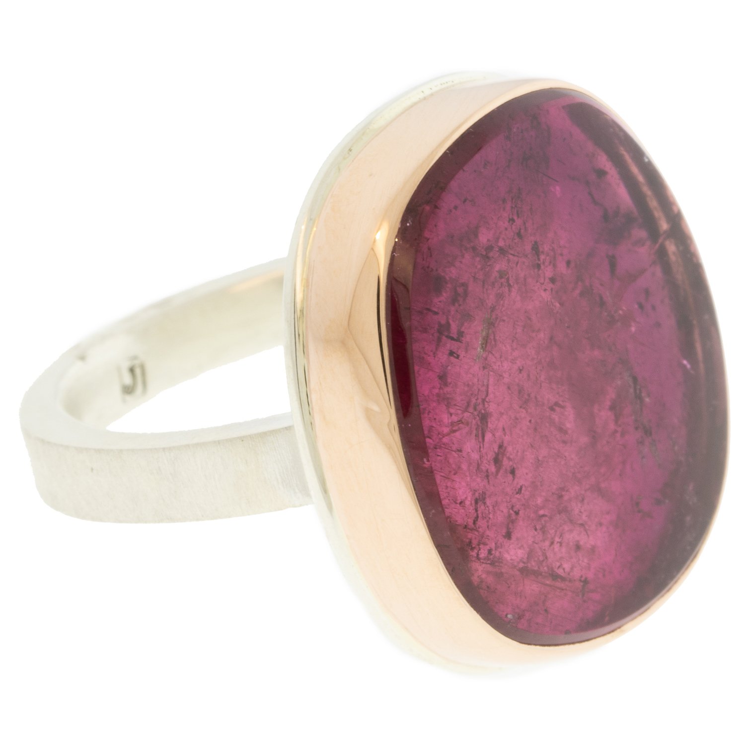 Jamie Joseph: Ring, Vertical asymmetrical smooth, 14K rose gold bezel set pink tourmaline, Sterling silver X band, Stone measures 7/8 x 3/4, Currently available in size 7 1/4