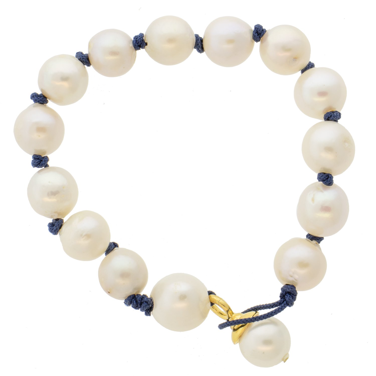 Catherine Canino: Large white freshwater pearl knotted bracelet with navy cord and polished 14K over brass detail