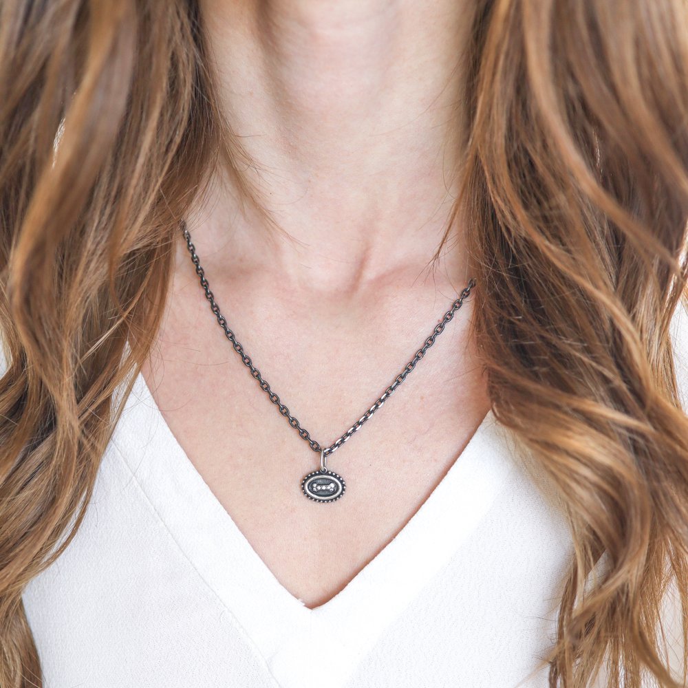 Erica Molinari Trunk Show: Charm, Small Oval Dogbone, Diamonds, .056 TCW, Sterling silver, Measures 3/4 x 5/8 including bail