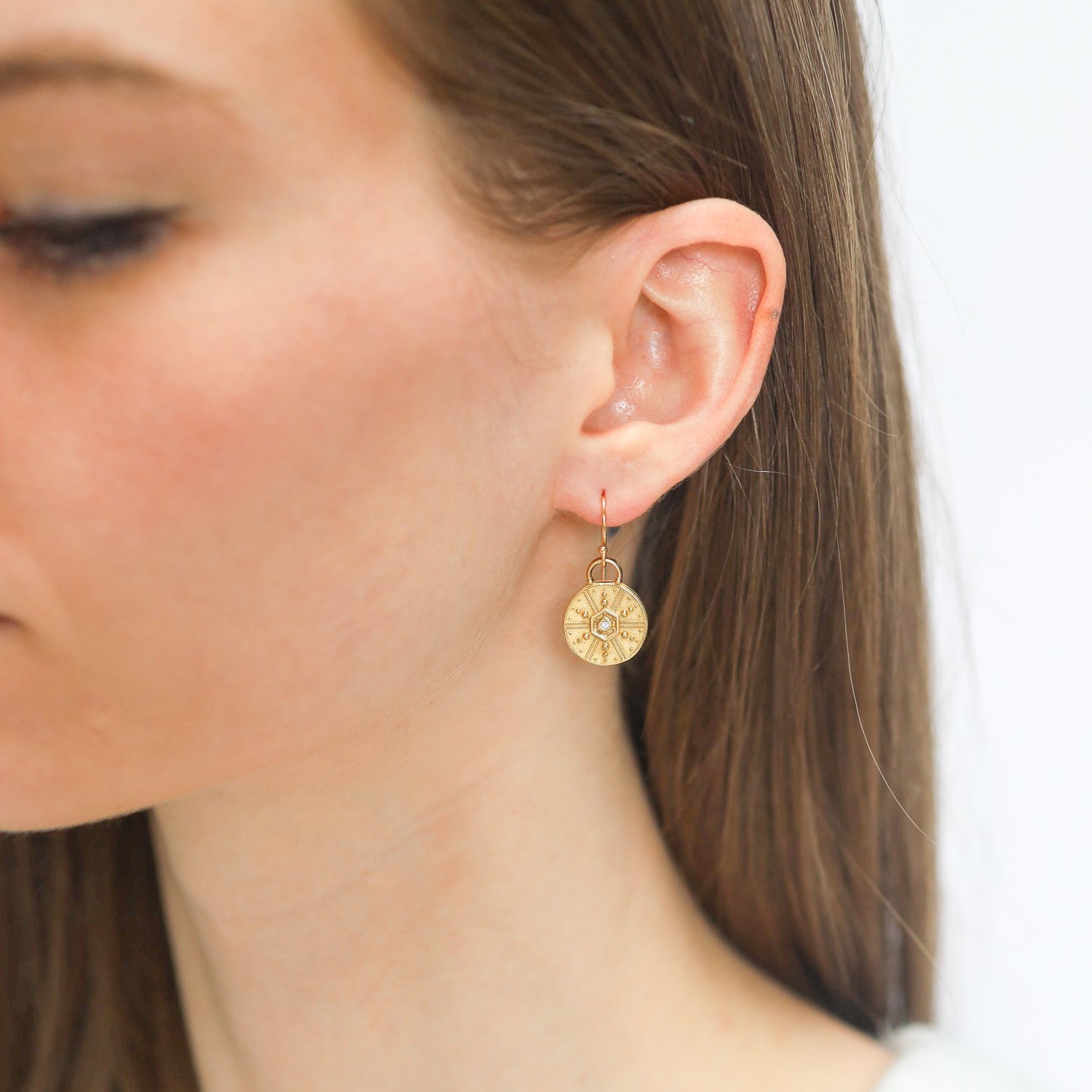 LuLu: Raja Earrings "explore new possibilities" 18k gold hoops with yellow bronze 1 1/8 x 1/2 inc 14k gold ear wire