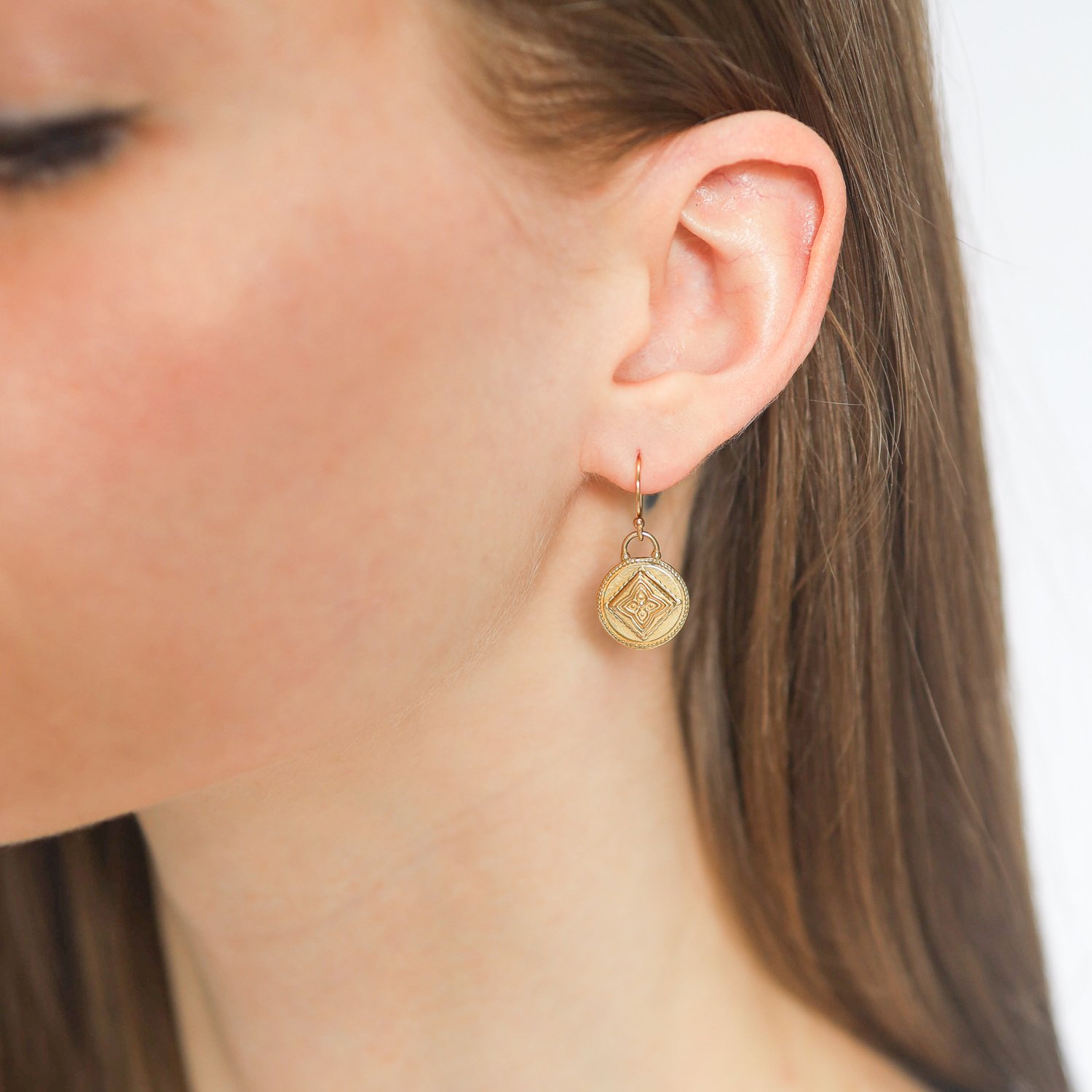 LuLu: Siddha Earrings "raise your frequency" yellow bronze 1 x 1/2 inc 14k gold ear wire