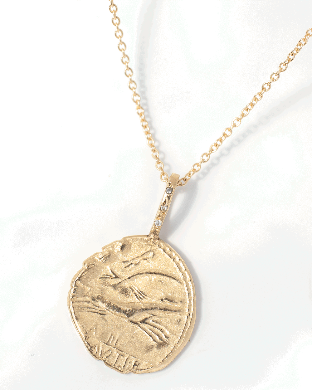 Harvest artifact necklace in 14k yellow gold by jewelry designer Robin Haley