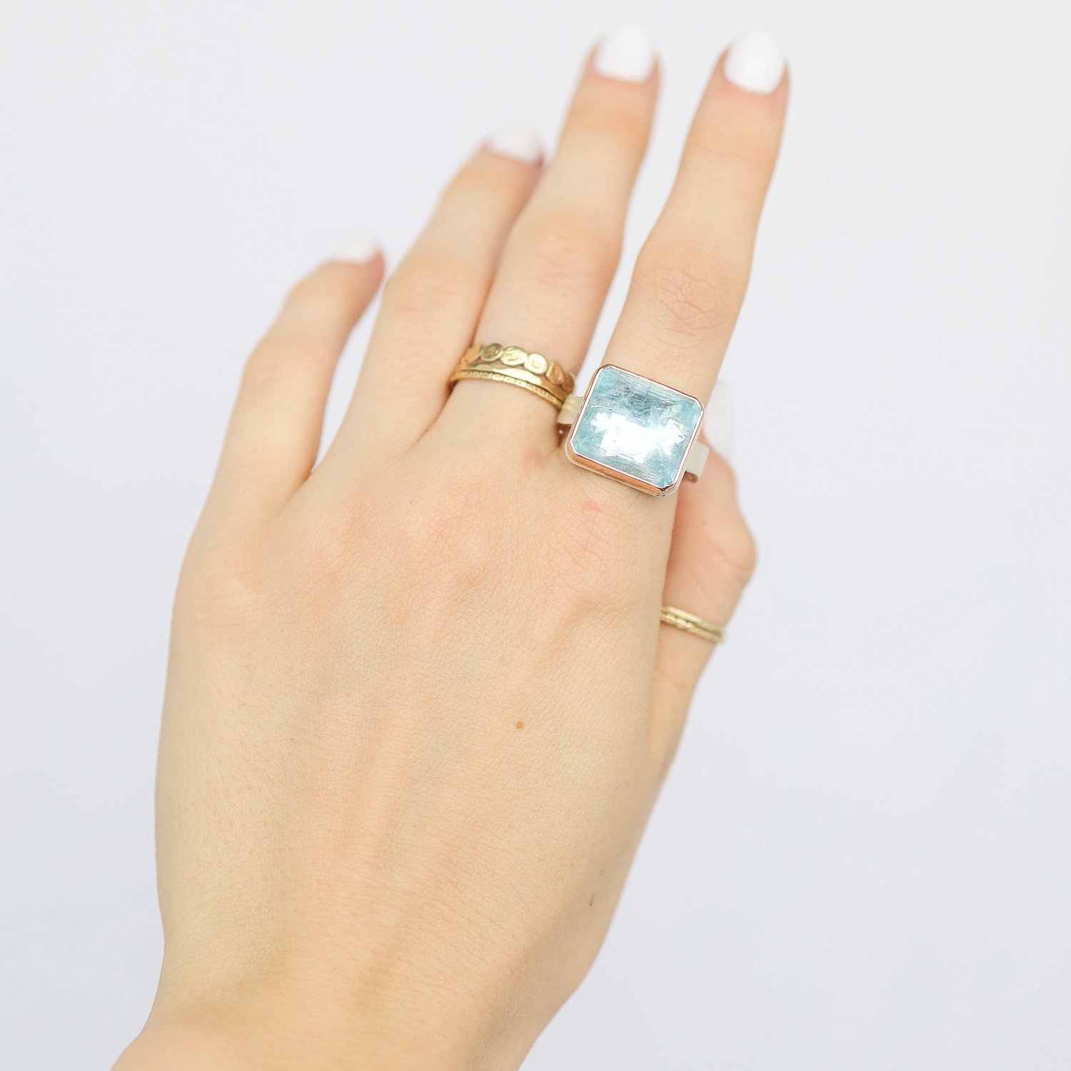 Jamie Joseph: Ring, Rectangular inverted, 14K rose gold bezel set aquamarine, Sterling silver live edge band, Stone measures 1/2 x 9/16, Currently available in size 7 1/2