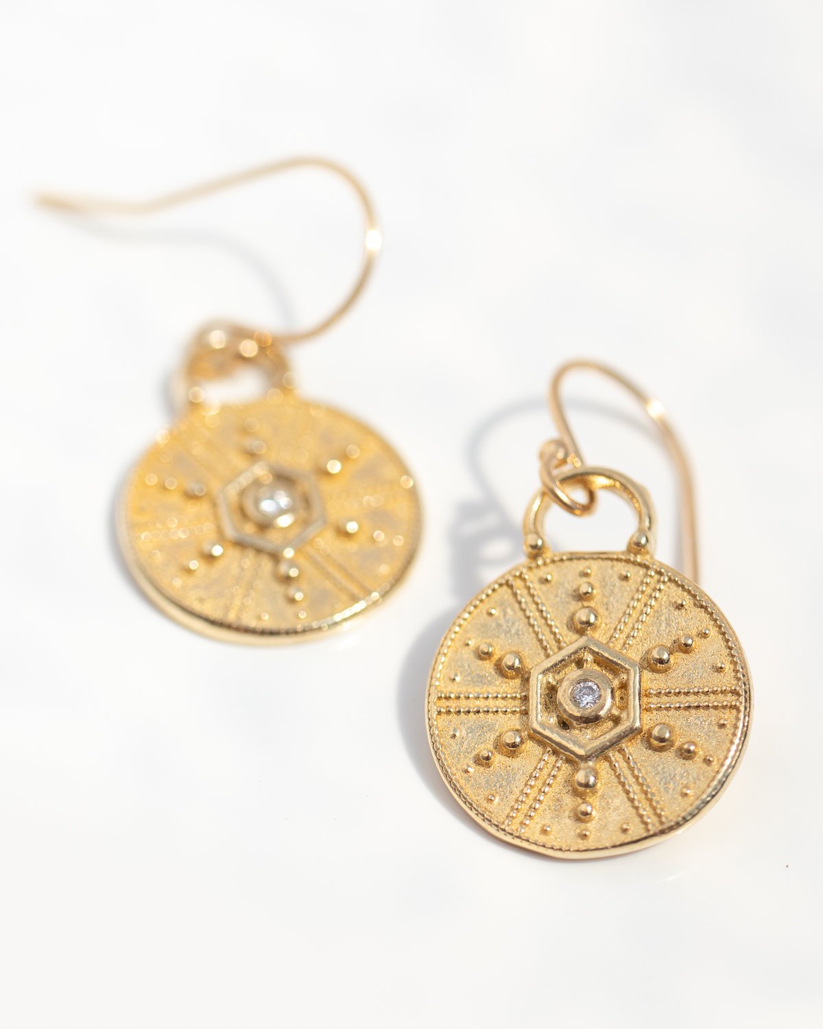 Round earrings in 18k gold-fill with diamonds by jewelry designer Lulu Designs