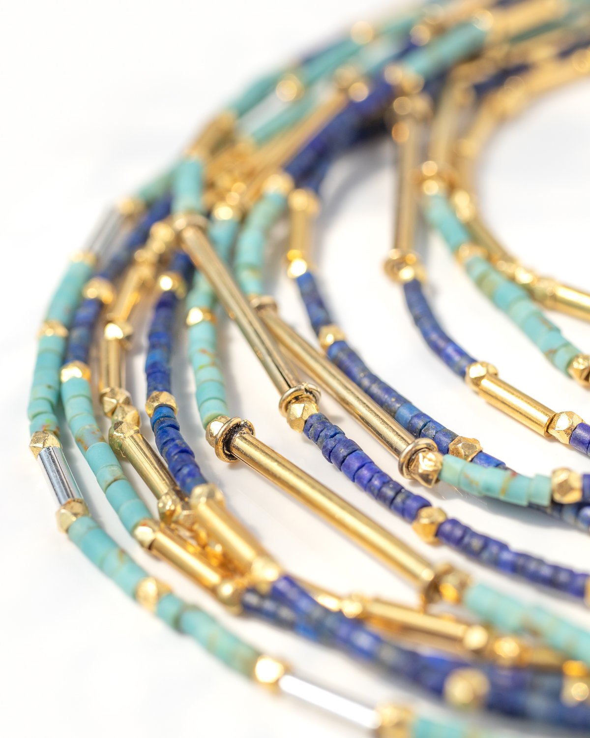 Earrings, hoops, and necklaces by jewelry designer Robindira Unsworth