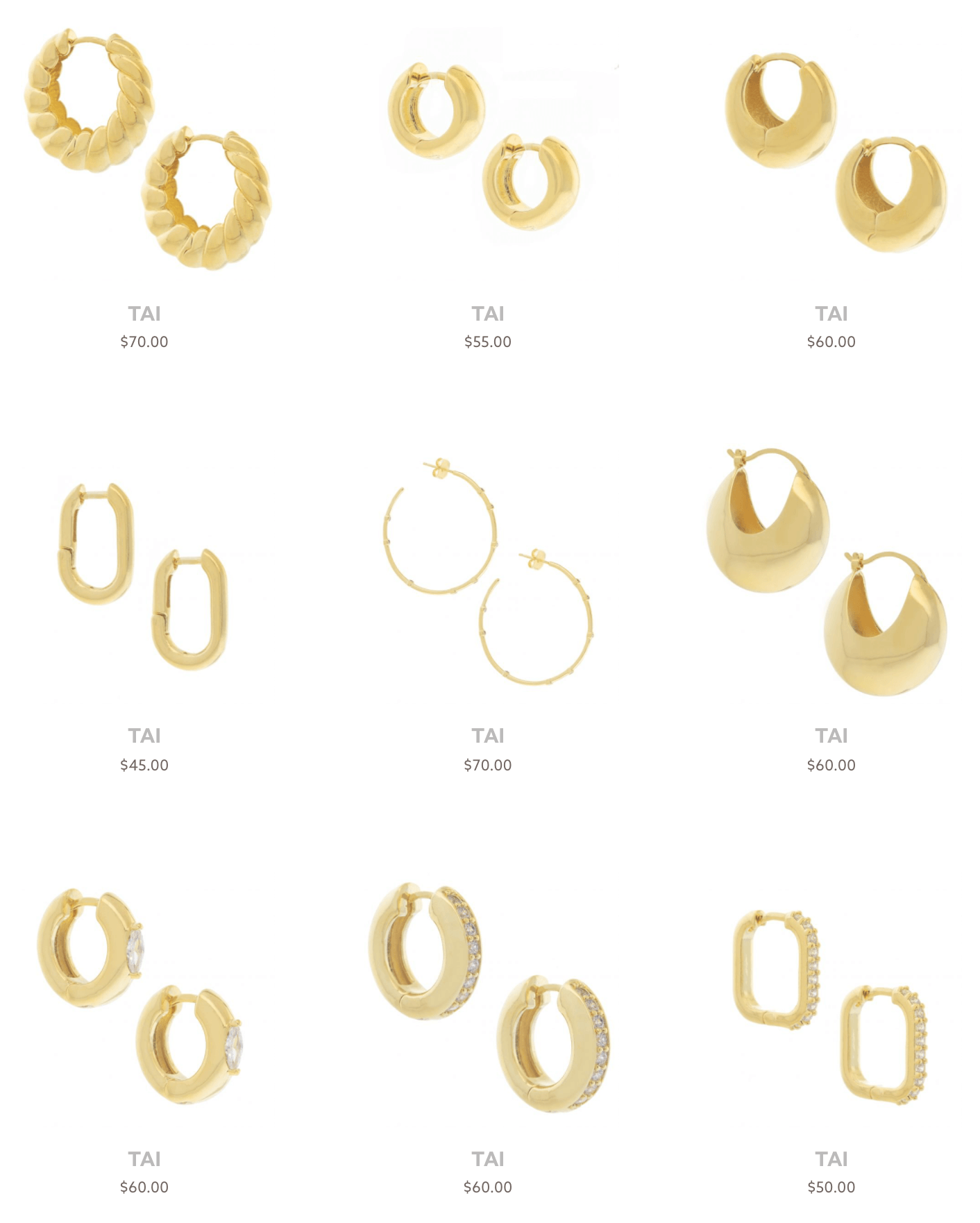 Gold hoop earrings by jewelry designer Tai