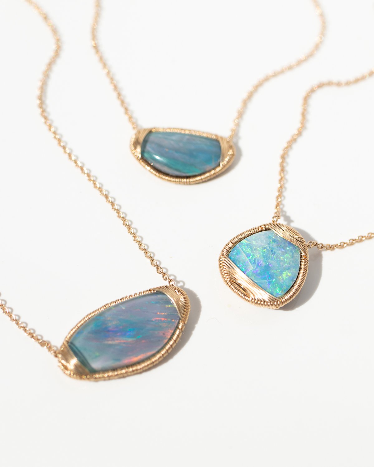 Gold wire wrapped opal necklaces by fine jewelry designer Dana Kellin