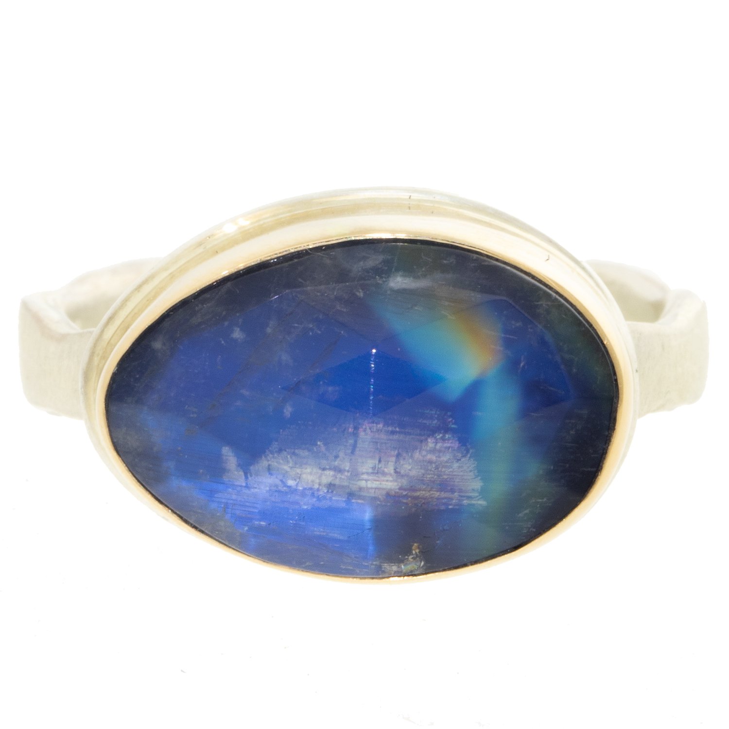 gold and silver ring with rainbow moonstone by jewelry designer Jamie Joseph