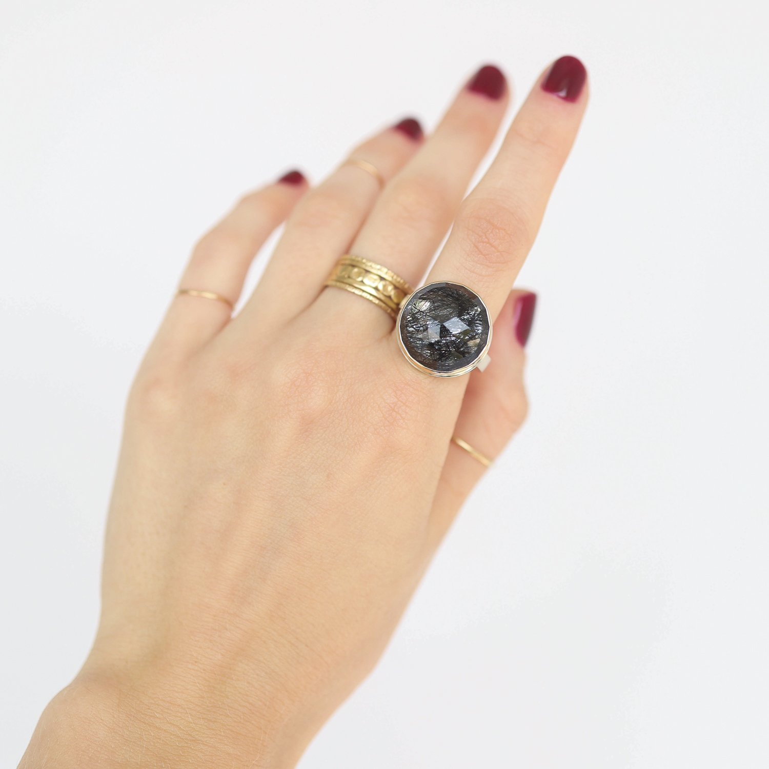 Jamie Joseph: Ring, Round rose cut, 14K gold bezel set tourmalinated quartz, Sterling silver X band, Stone measures 5/8 x 5/8, Currently available in size 7 1/4