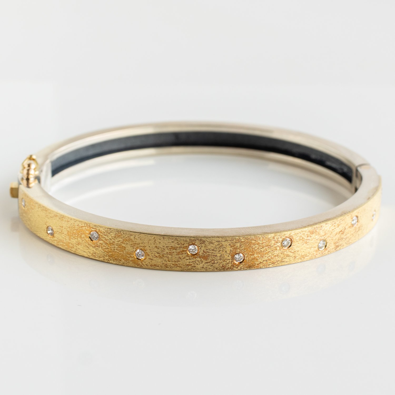 Rene Escobar Trunk Show: Bangle, 6MM, 18K yellow gold front, Oxidized sterling silver back, Diamonds, .22 TCW, Size medium