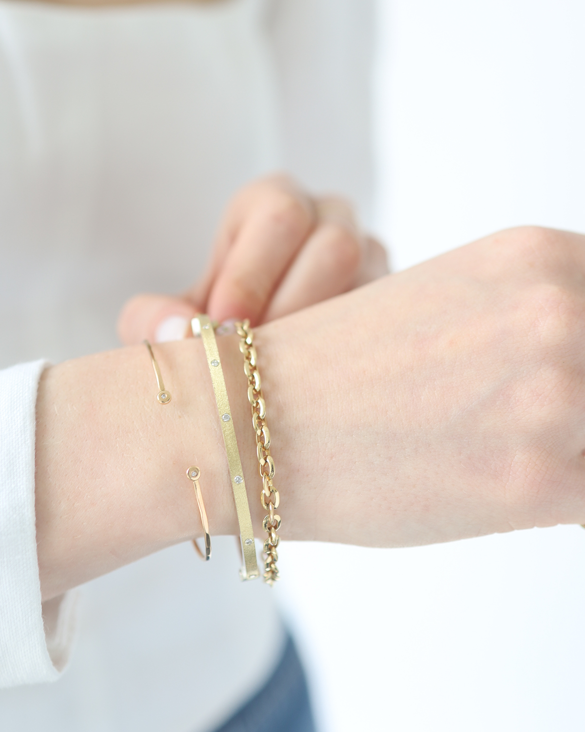 Melissa Joy Manning: Thin cuff bracelet with 2 white diamonds,flush set