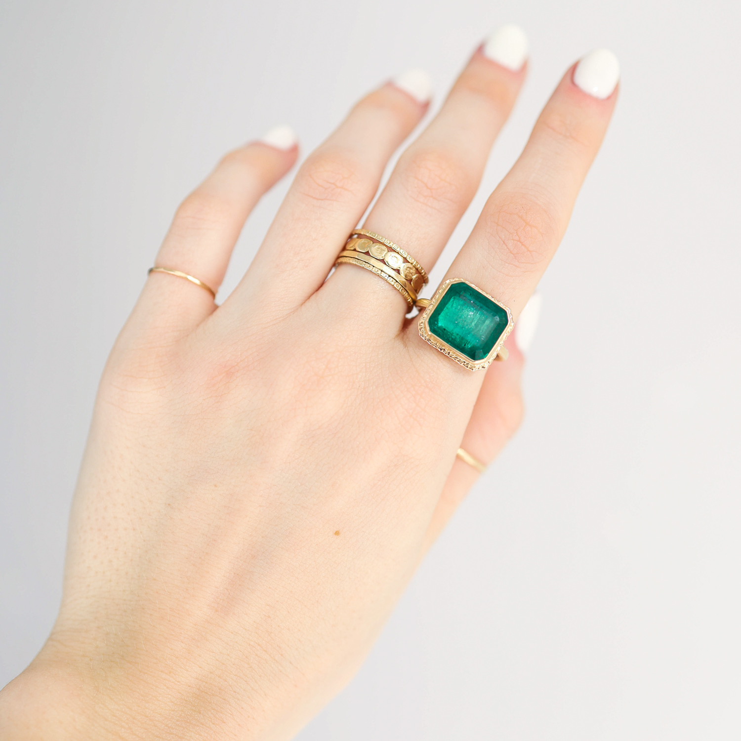 Jamie Joseph: SS & 14k Gold Ring w/ Rectangular Table up 6.63 ct ZAMBIAN EMERALD on Ruffled Platform and Sand Band