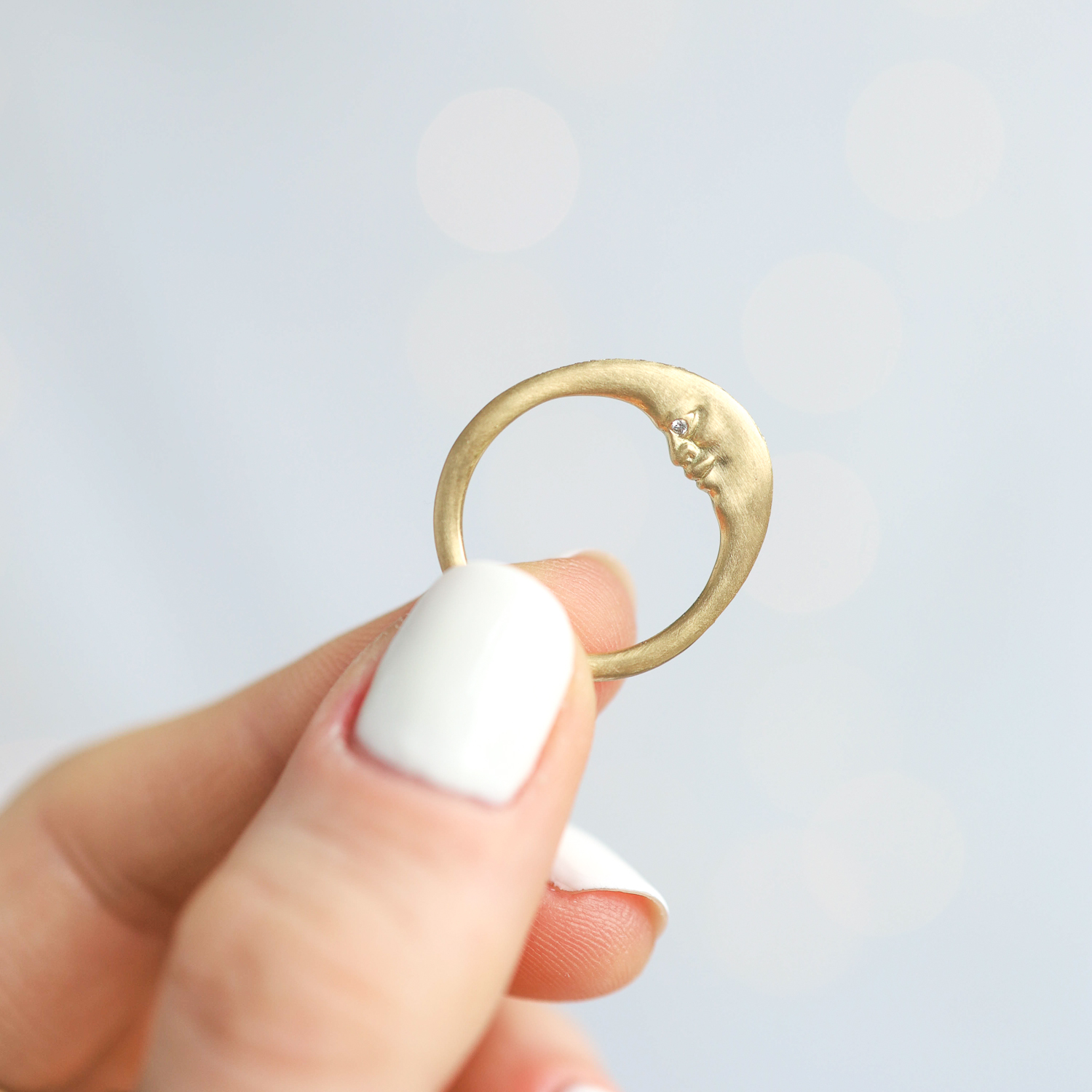 Anthony Lent: Diamond Crescent Moonface Ring with Diamond Eyes bright cut setting 18K .25ct